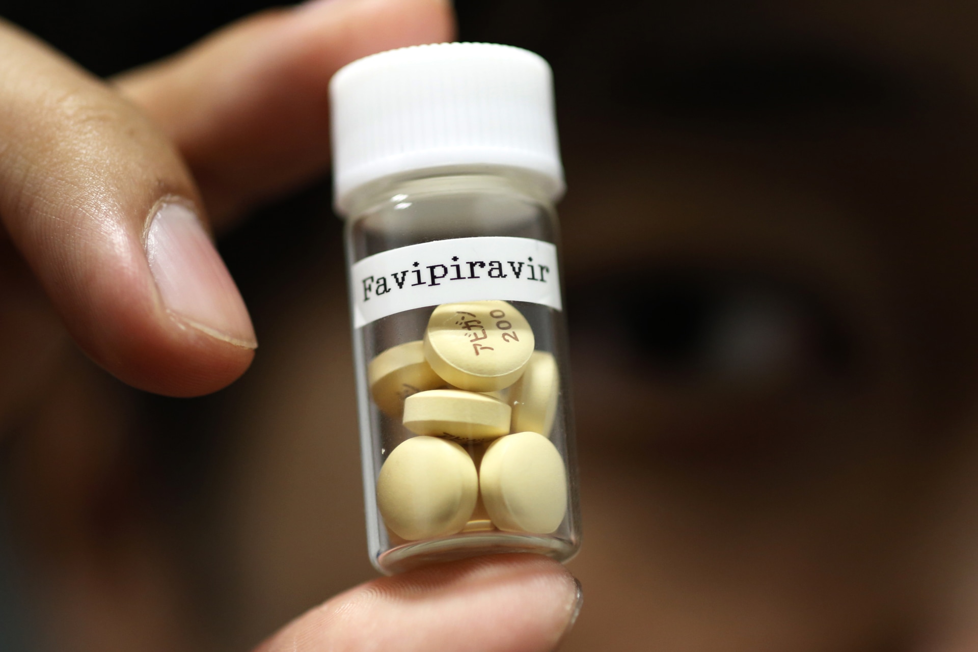<p>Tablets of Avigan (generic name: Favipiravir), a drug approved as an anti-influenza drug in Japan and developed by a subsidiary of Fujifilm Holdings, are displayed during a photo opportunity at Fujifilm’s headquarters in Tokyo on October 22, 2014.</p>