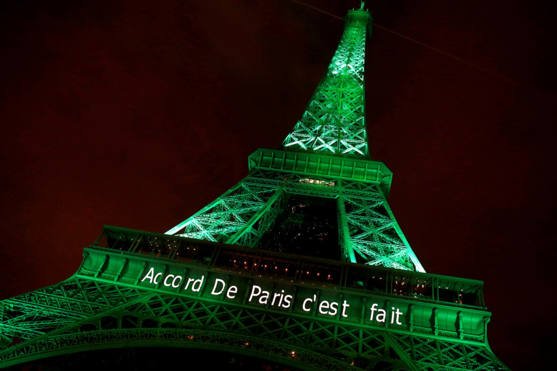 <p>The Eiffel tower is illuminated in celebration of the Paris Agreement’s entry into force in November 2016.</p>
