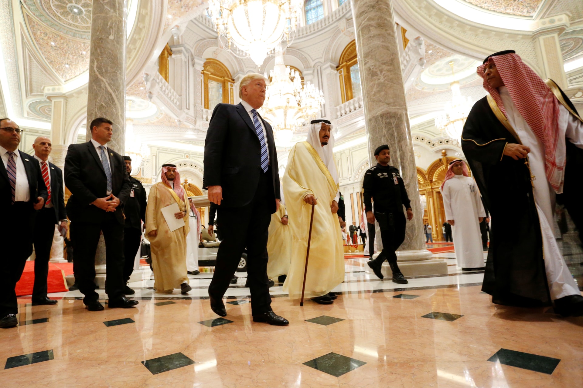 <p>U.S. President Donald J. Trump walks with Saudi King Salman at a summit in Riyadh.</p>