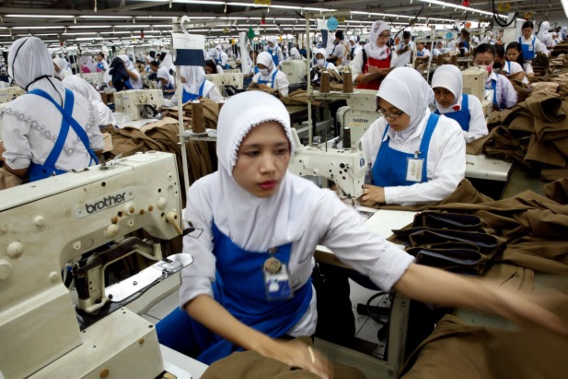 <p>A worker holds part of a pair of trousers at PT Trisula Garmindo Manufacturing in Bandung, West Java province September 17, 20… Asia’s big manufacturing economies, a status it lost in the mid-1990s. Picture taken September 17, 2013 (Reuters/Beawiharta).</p>
