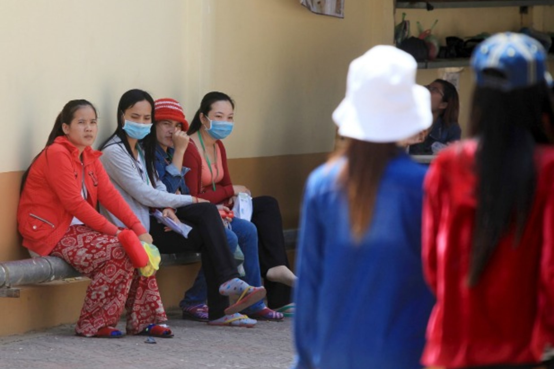 <p>Garment workers rest inside a factory after their lunch time in Phnom Penh October 8, 2015. Cambodia agreed on Thursday to rai…ear, short of the figures demanded by powerful trade unions long at odds with the government over pay (Reuters/Samrang Pring).</p>