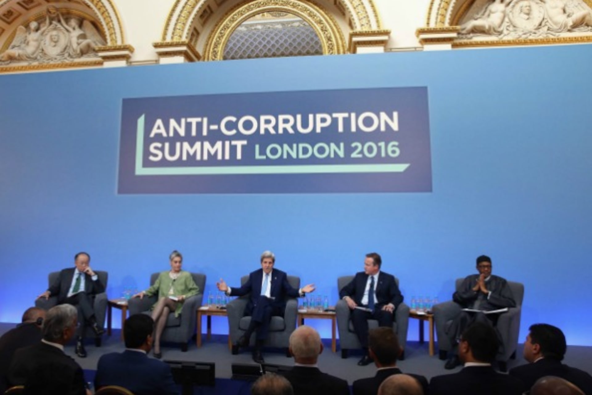 <p>British Prime Minister Cameron is joined by Jim Yong Kim, President of the World Bank Group, (left) Sarah Chayes, a senior ass…in London for the summit, which is aimed at stepping up action to tackle the problem of corruption (Reuters/Dan Kitwood/Pool).</p>