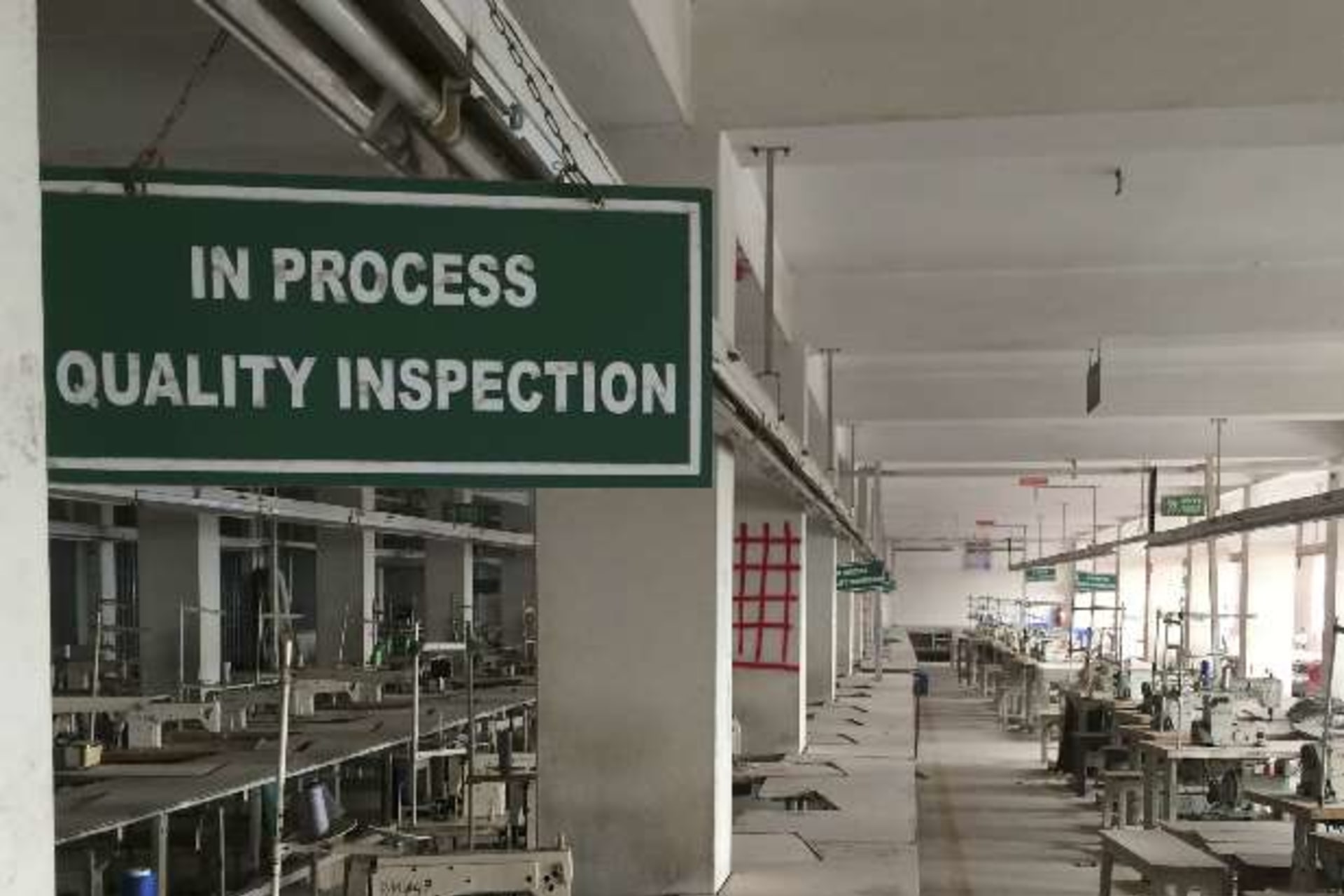<p>A sign is seen as a building safety assessment is being conducted at an Adorn Knitwear garments factory in Dhaka, December 9, …sewing machines gathering dust as the lengthy process of checking the building for structural weakness was underway (Reuters).</p>