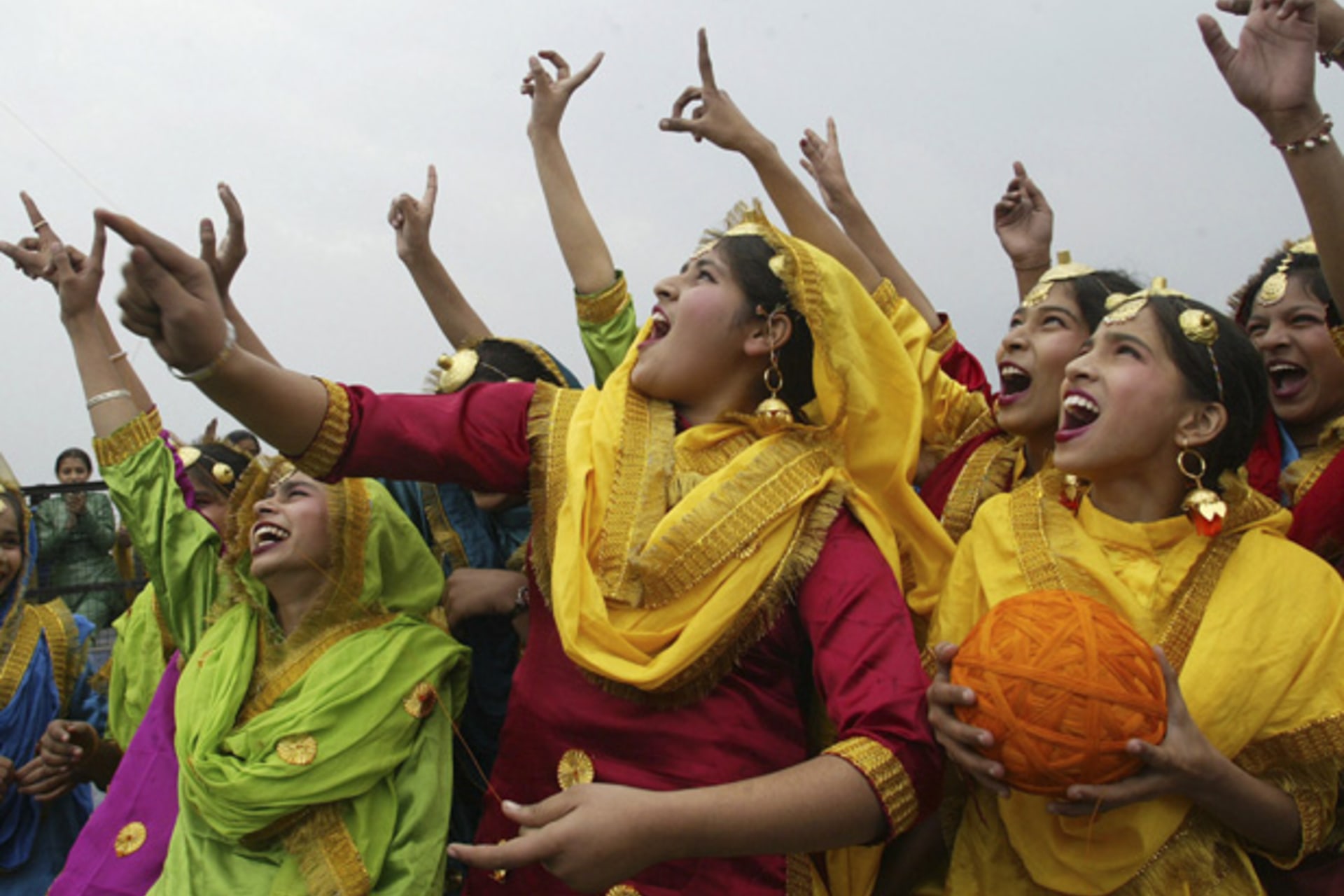 <p>Schoolgirls wearing colourful dresses cheer as they fly a kite during an event to mark the Basant or spring festival in the no… is celebrated mainly in the Indian states of Haryana and Punjab marking the start of the spring season. REUTERS/Munish Sharma</p>
