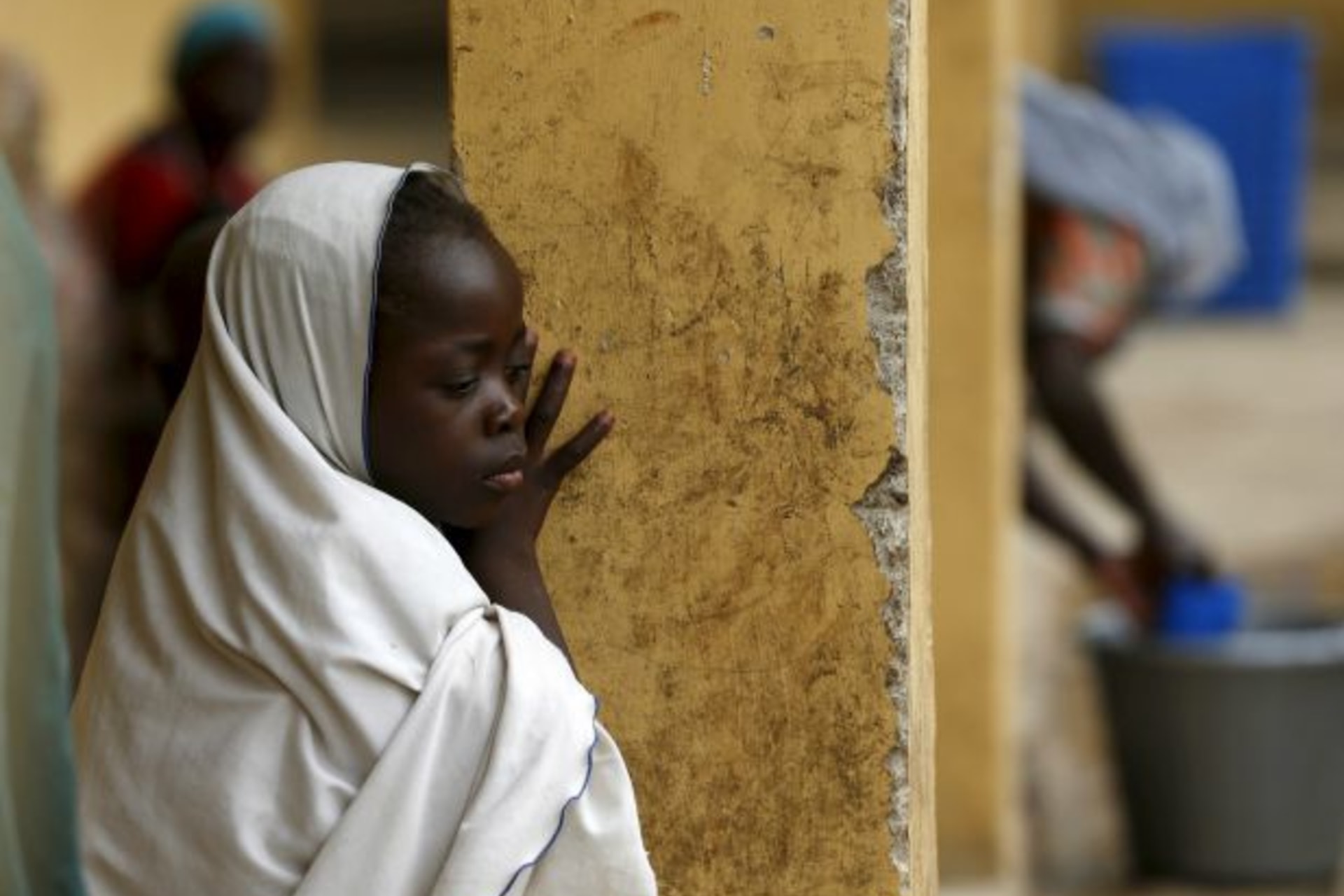 <p>Children rescued from Boko Haram in Sambisa forest react at a clinic at the internally displaced people’s camp in Yola, Nigeria, May 2015 (Afolabi Sotunde/Reuters).</p>