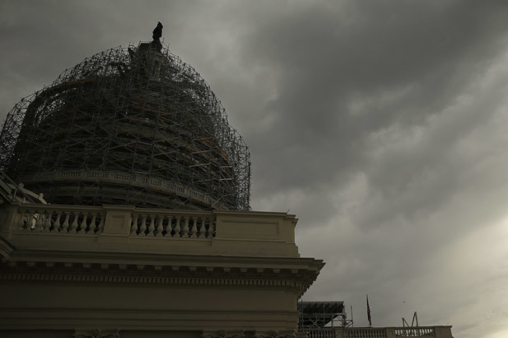 <p>storm clouds Capitol dome Washington</p>
