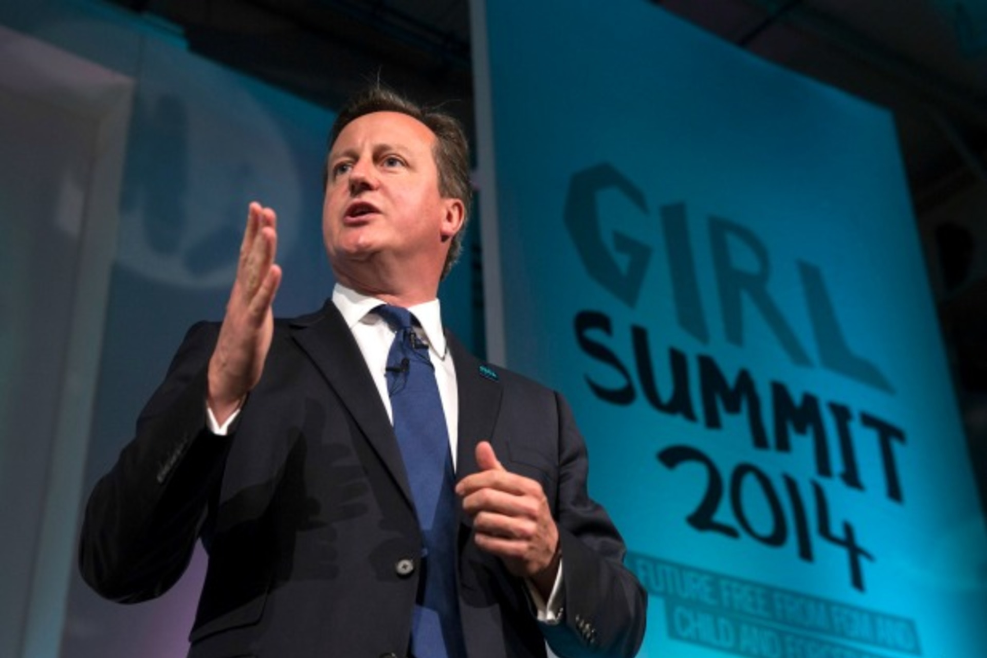 <p>Britain’s Prime Minister David Cameron speaks at the Girl Summit in London, July 22, 2014. The prime minister announced that B…it compulsory for teachers and health workers to report cases of female genital mutilation (Courtesy Reuters/Oli Scarff/Pool).</p>
