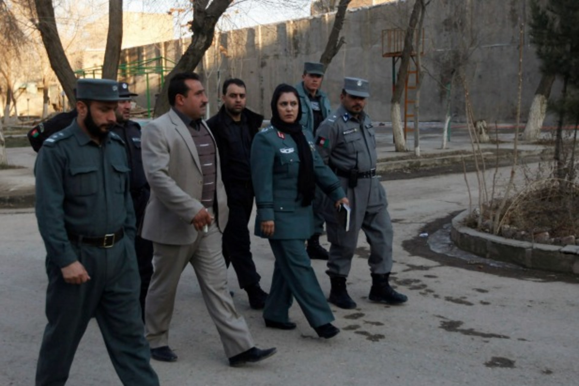 <p>Colonel Jamila Bayaaz, the first female district police chief in Afghanistan, walks in Kabul, January 15, 2014 (Courtesy Reuters/Mohammad Ismail).</p>

