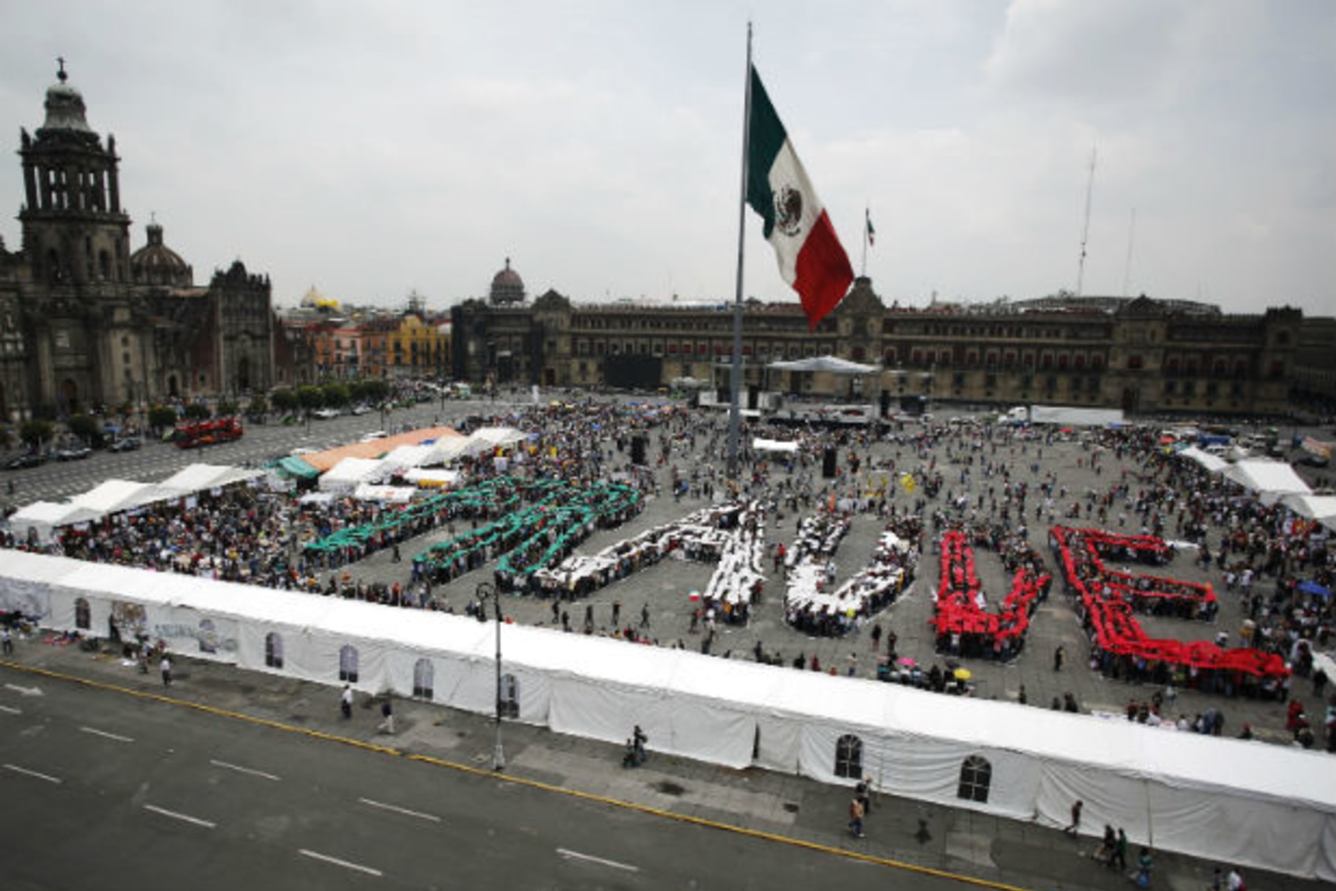 <p>Supporters of Andrés Manuel López Obrador, runner up in Mexico’s recent presidential election, come together to form the word FRAUD as part of the “Expo Fraud” at Zocalo square in Mexico City, August 12, 2012 (Stringer/Courtesy Reuters).</p>