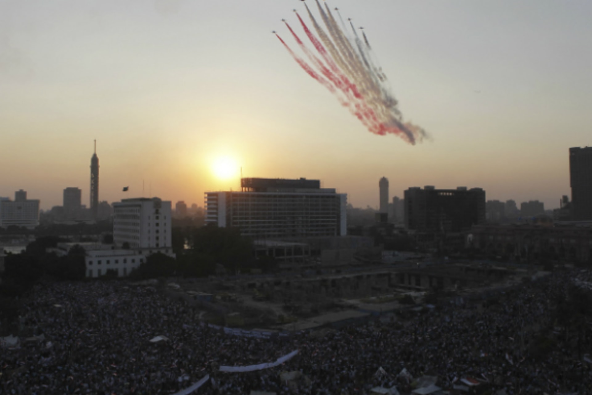 <p>Egyptian military jets fly over Tahrir square as protesters who are against former Egyptian President Mohamed Mursi gather, in Cairo July 7, 2013. (Courtesy REUTERS/Amr Abdallah Dalsh)</p>
