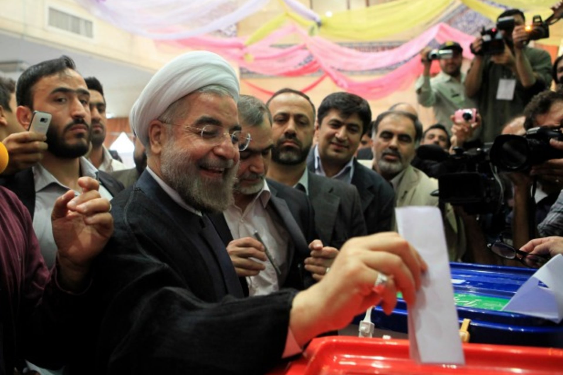 <p>Presidential candidate Hassan Rouhani casts his ballot during the Iranian presidential election, June 14, 2013 (Yalda Moayeri/Courtesy Reuters)</p>
