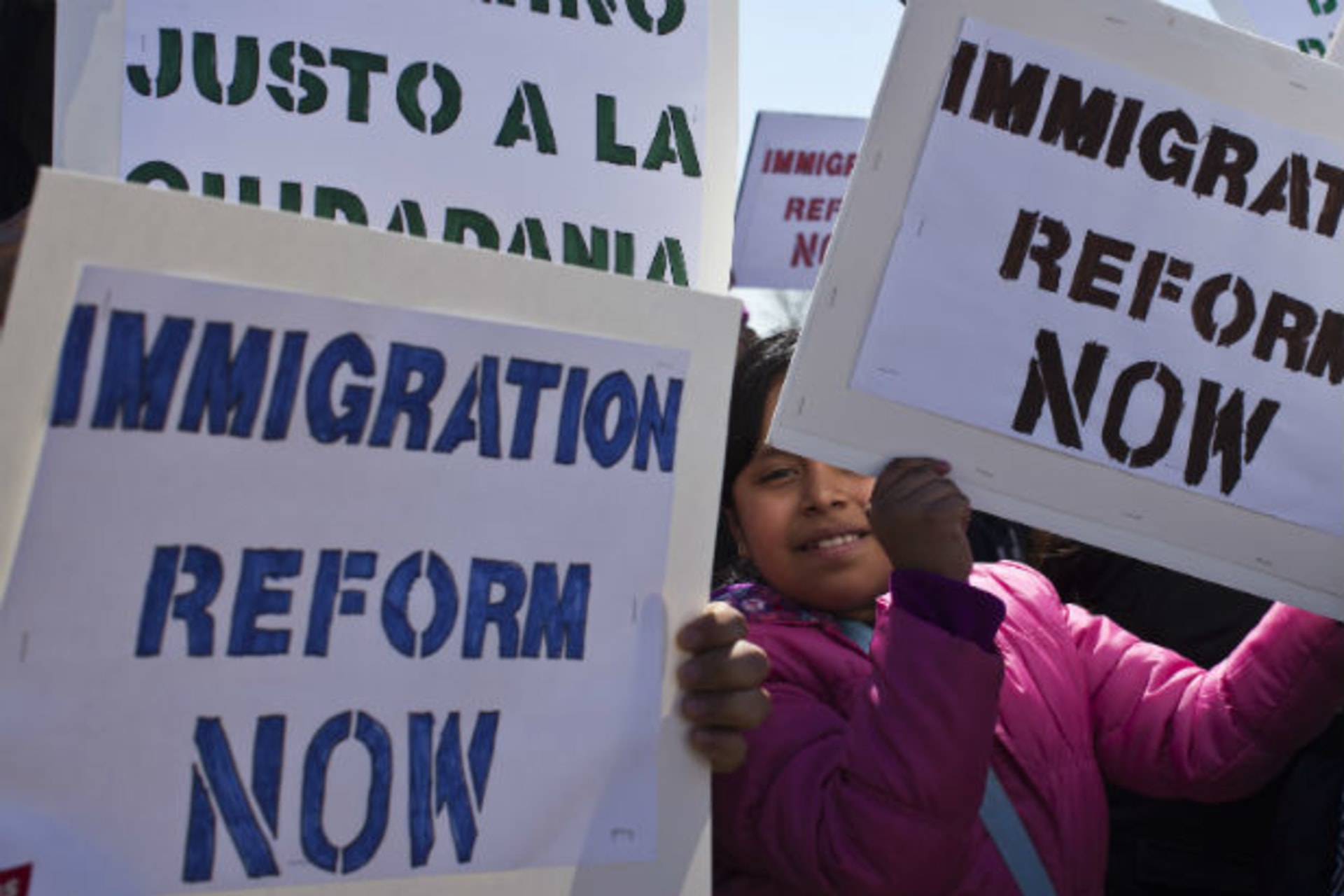 <p>A girl holds up a banner while people take part in a rally to demand that Congress fix the broken immigration system at Liberty State Park in Jersey City, New Jersey, April 6, 2013 (Eduardo Munoz/Courtesy Reuters).</p>
