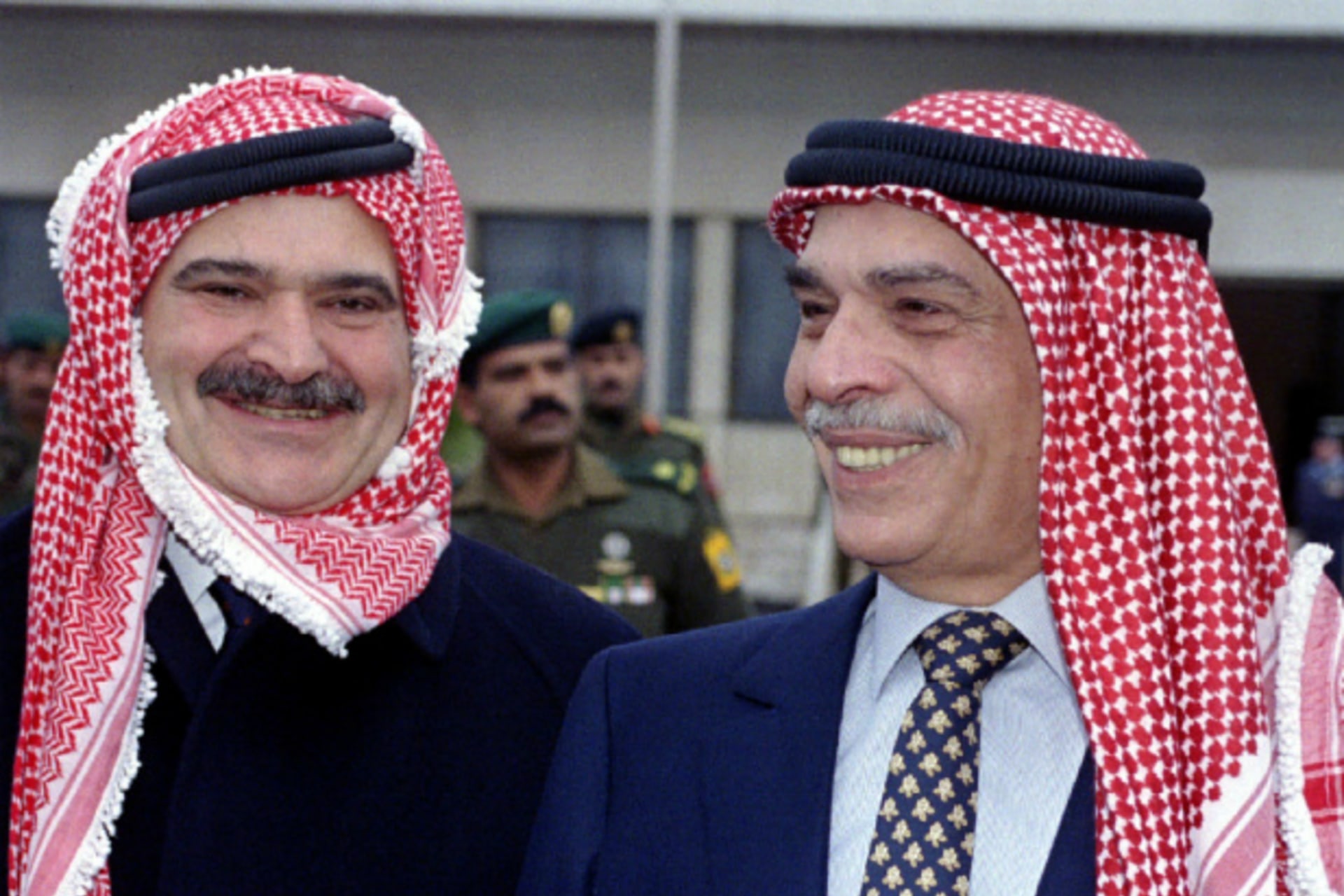 <p>Jordan’s King Hussein (R) and Crown Prince Hassan pose for photographers at Amman airport February 11, 1996. (Courtesy REUTERS).</p>