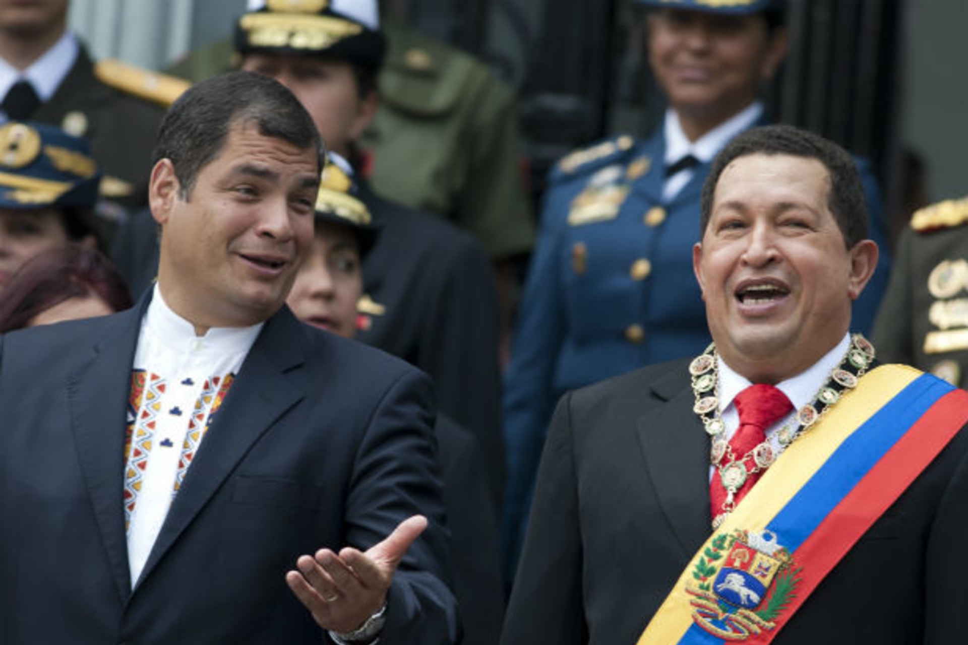 <p>Ecuador’s President Correa and Venezuela’s President Chavez sing national anthem during a ceremony in Caracas</p>
