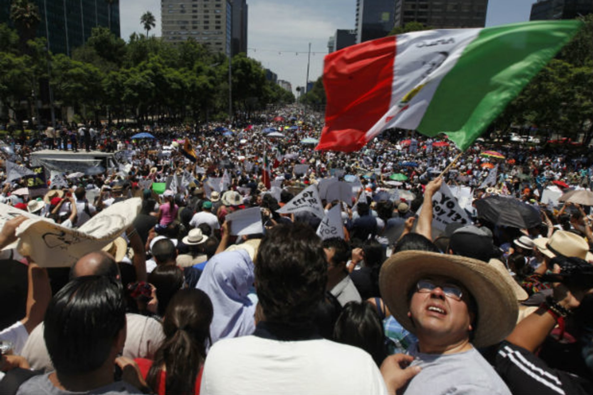 <p>Members of the anti-PRI opposition movement “Yosoy132” take part in a protest in Mexico City</p>
