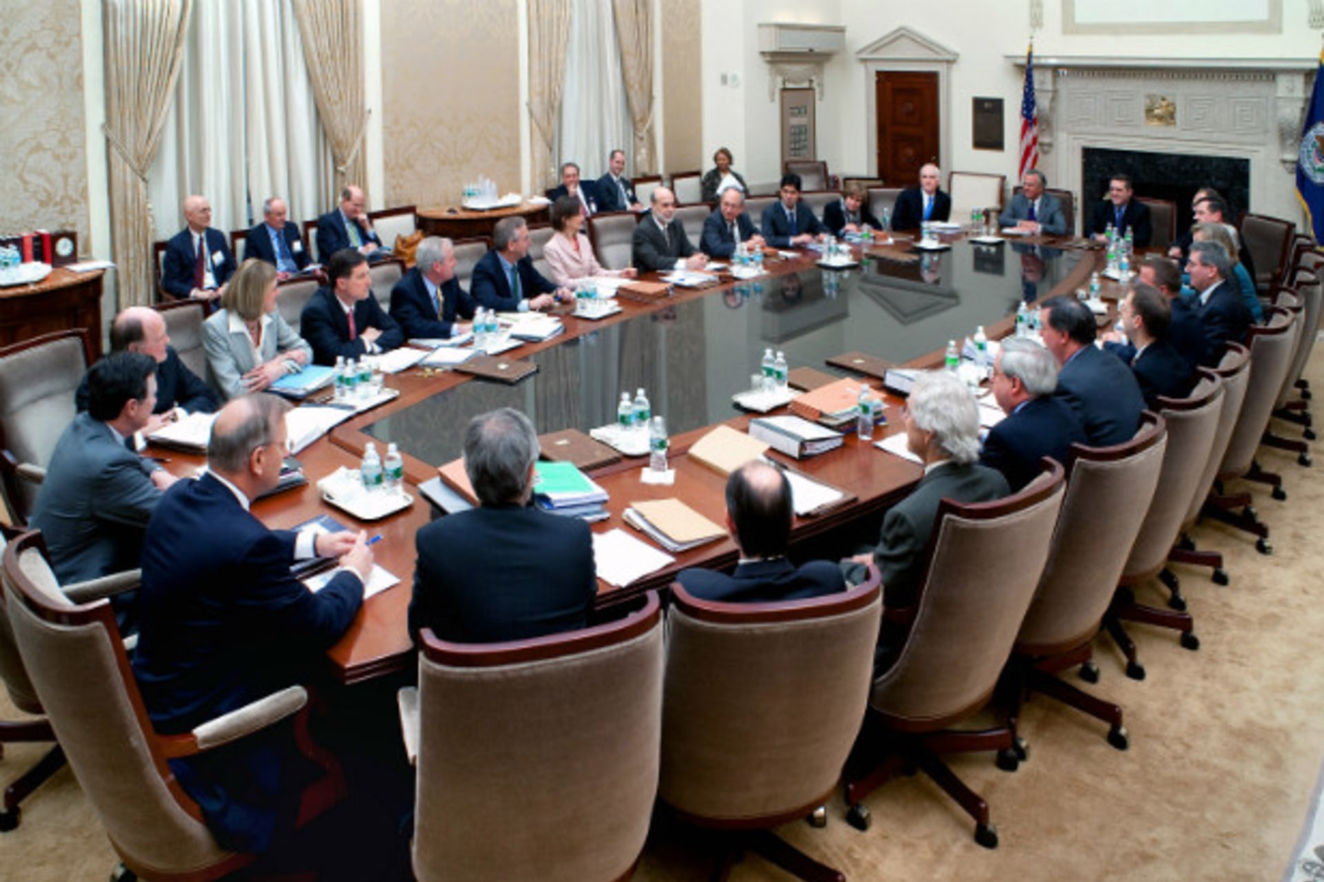 <p>Chairman Ben Bernanke leads a meeting of the Federal Open Market Committee (FOMC)—the body that sets interest rate policy—in March 2009 (Handout/Courtesy Reuters).</p>

