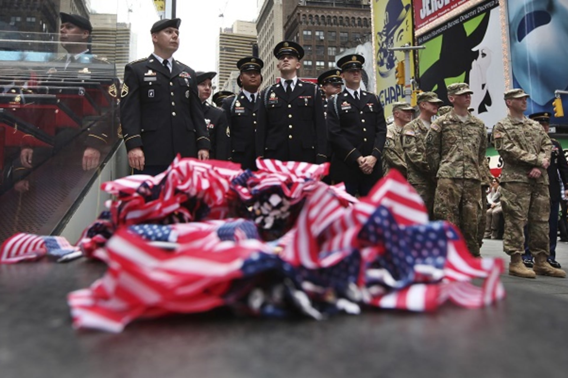 United States Army soldiers stand before the start of the Army's 237th anniversary celebrations at Times Square in New York
