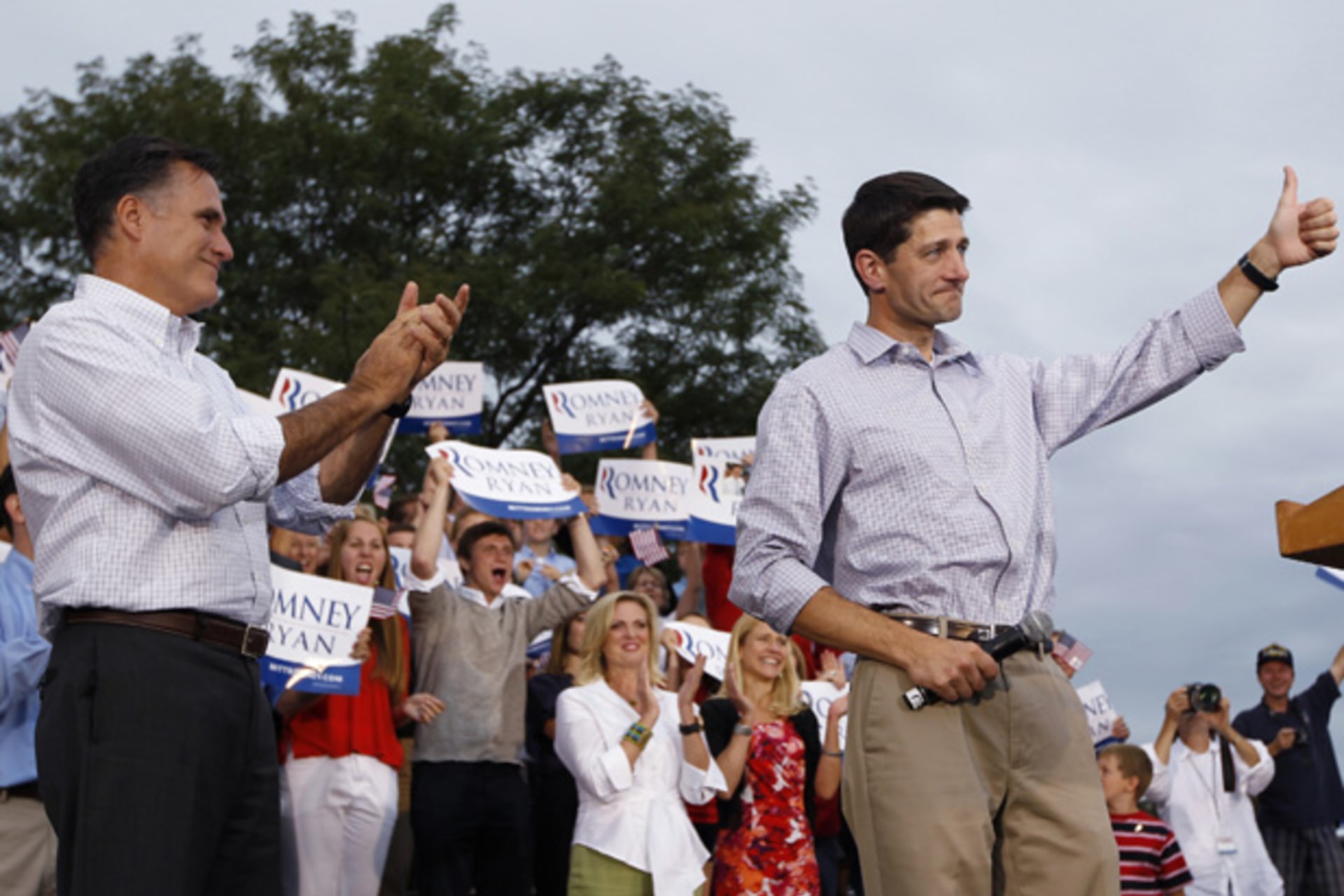 <p>Mitt Romney claps as vice president select Paul Ryan (R-WI) gives the thumbs up to supporters during a campaign event in Wisconsin. (Shannon Stapleton/courtesy Reuters)</p>
