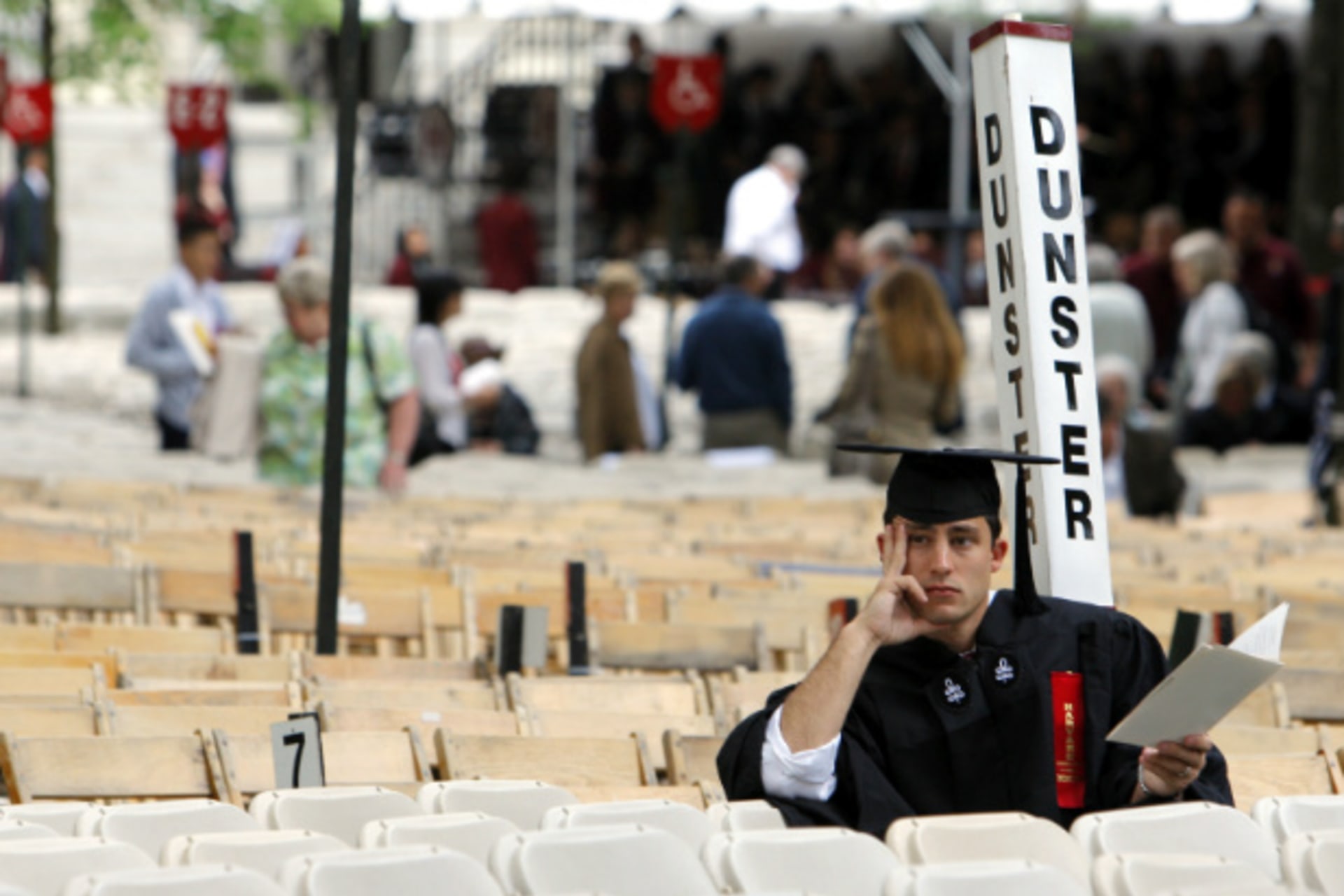 <p>A graduating Harvard student waits for the start of commencement ceremonies in 2009. (Brian Snyder/Courtesy Reuters)</p>
