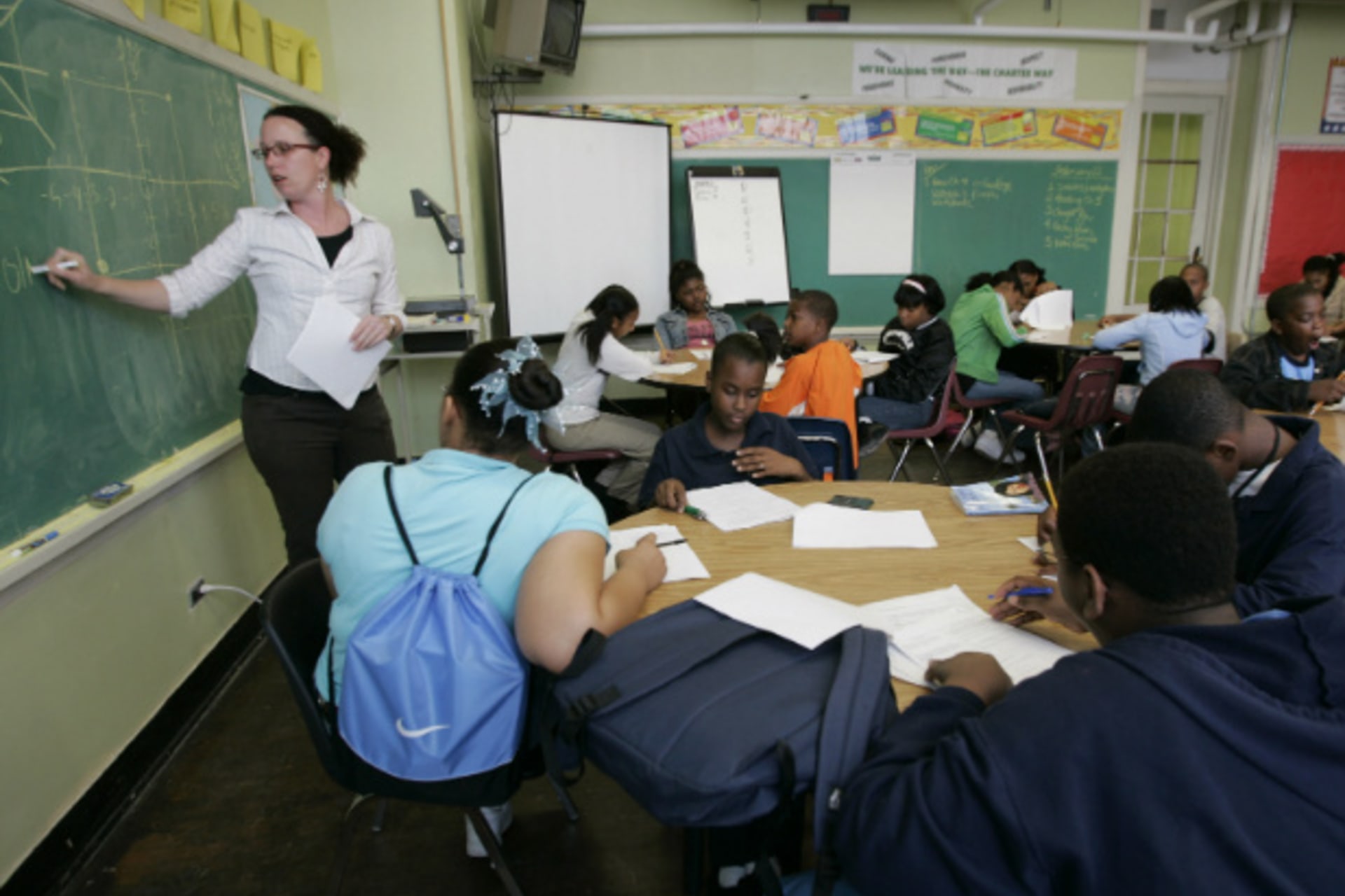 <p>Teacher Darcy McKinnon teaches math to her seventh grade class at Samuel J. Green Charter School in New Orleans February 22, 2006.(Lee Celano/Courtesy Reuters)</p>
