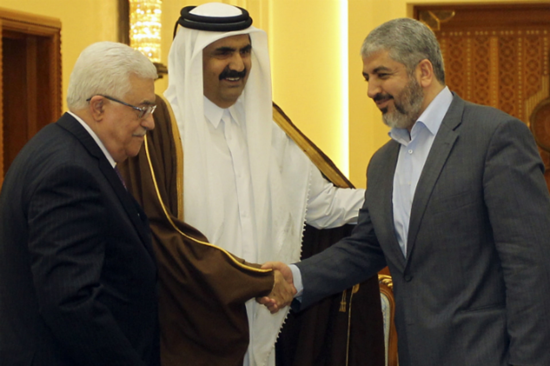 <p>Palestinian President Mahmoud Abbas, Qatar’s Emir Sheikh Hamad bin Khalifa al-Thani and Hamas leader Khaled Meshaal (L-R) talk…independent technocrats for the West Bank and Gaza, headed by Palestinian President Mahmoud Abbas. (Courtesy REUTERS/Stringer)</p>

