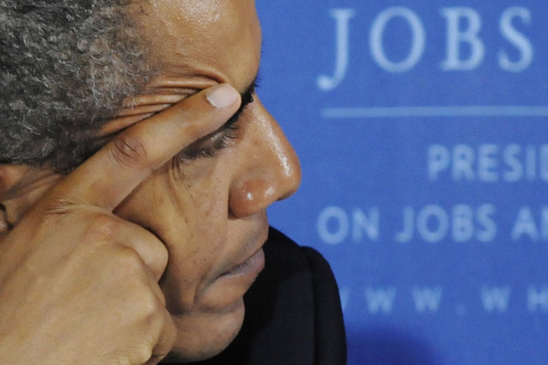 <p>President Barack Obama listens to reports during a meeting of the President’s Council on Jobs and Competitiveness in October 2011 (Jonathan Ernst/Courtesy Reuters).</p>
