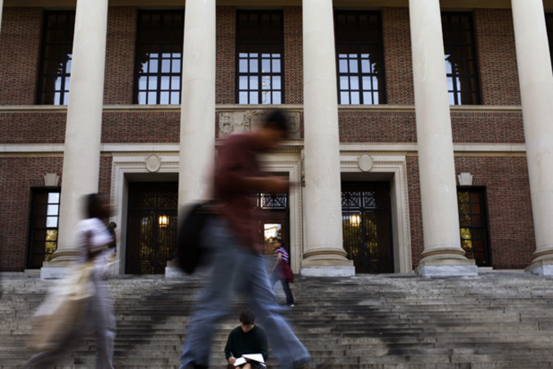 <p>Students outside of Widener Library at Harvard University, one of several universities now offering massive open online courses. (Brian Snyder/ courtesy Reuters)</p>
