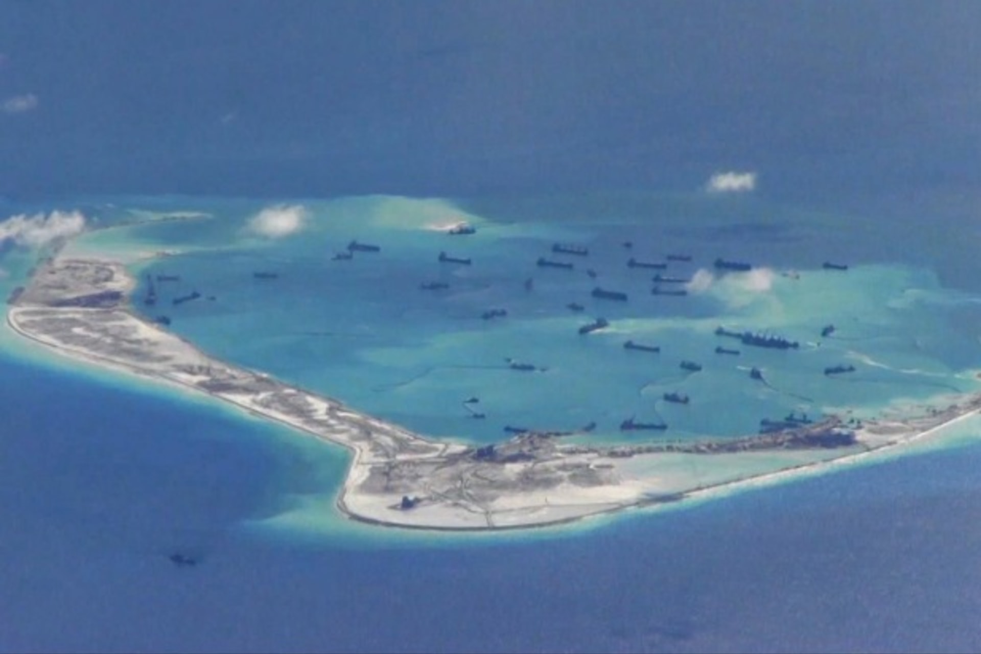 <p>Chinese dredging vessels are purportedly seen in the waters around Mischief Reef in the disputed Spratly Islands in the South …y a P-8A Poseidon surveillance aircraft provided by the United States Navy May 21, 2015. REUTERS/U.S. Navy/Handout via Reuters</p>
