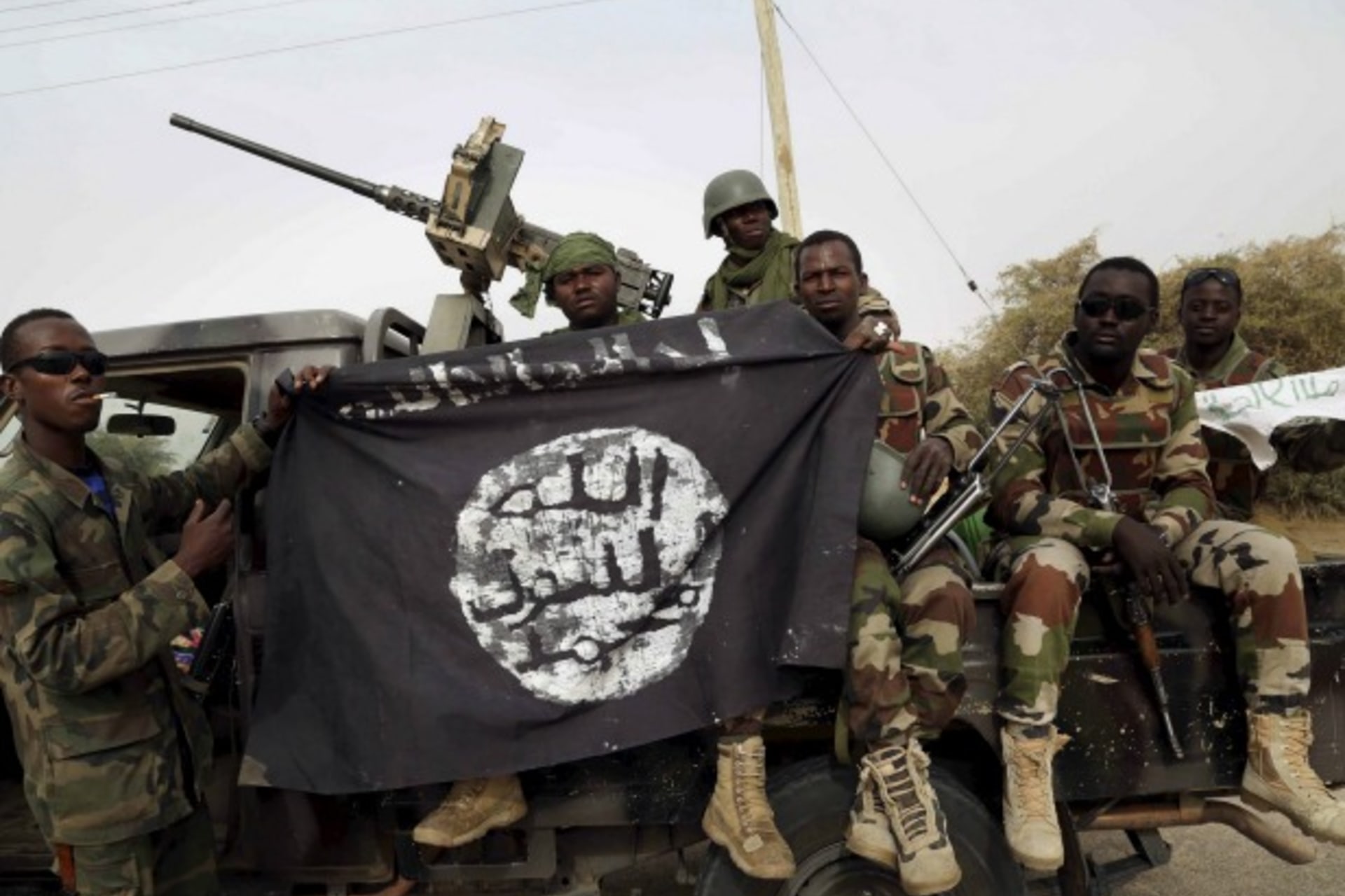 Nigerian Soldiers Pose With Captured Flag