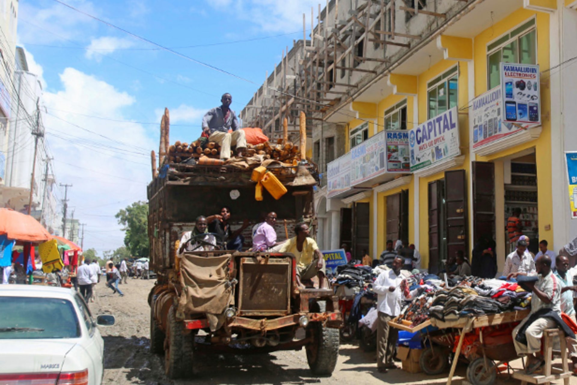 A truck drives through Bakara market in Mogadishu October 5, 2013.