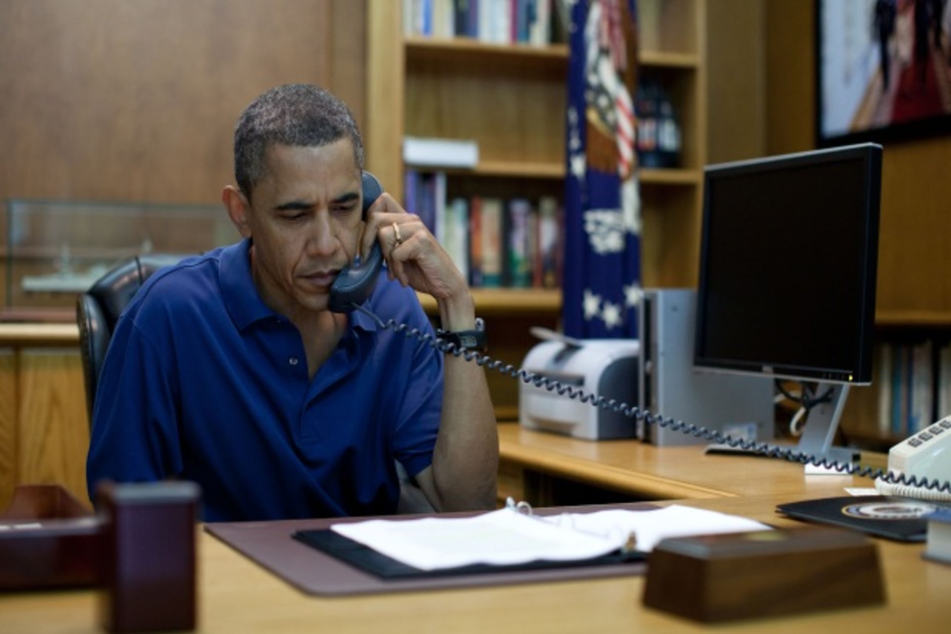 <p>U.S. president Barack Obama holds a conference call from Camp David, Maryland (Handout/Courtesy Reuters).</p>