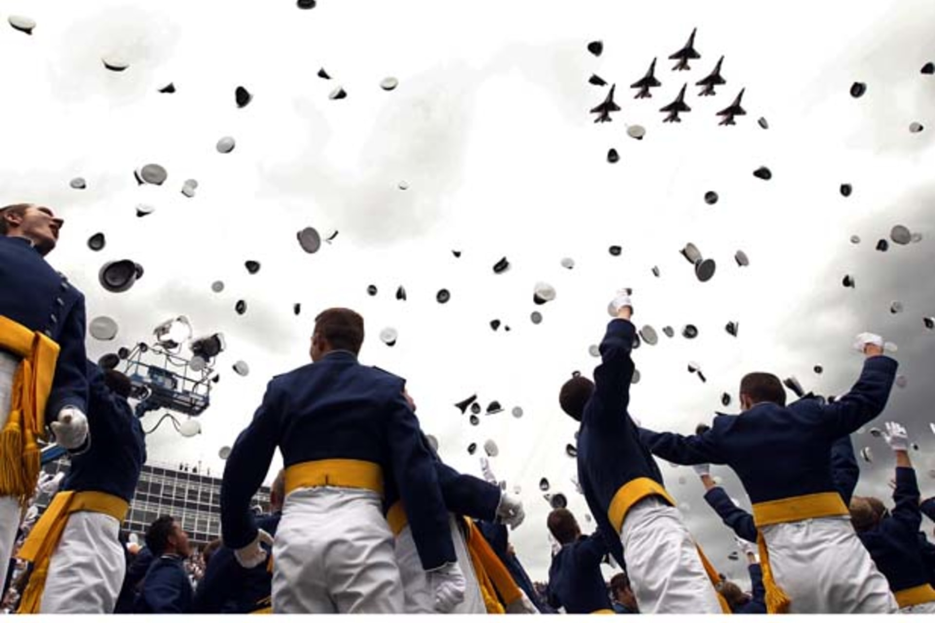 <p>The Thunderbirds fly past as graduates celebrate at the Air Force Academy commencement ceremony in Colorado Springs (Kevin Lamarque/Courtesy Reuters).</p>
