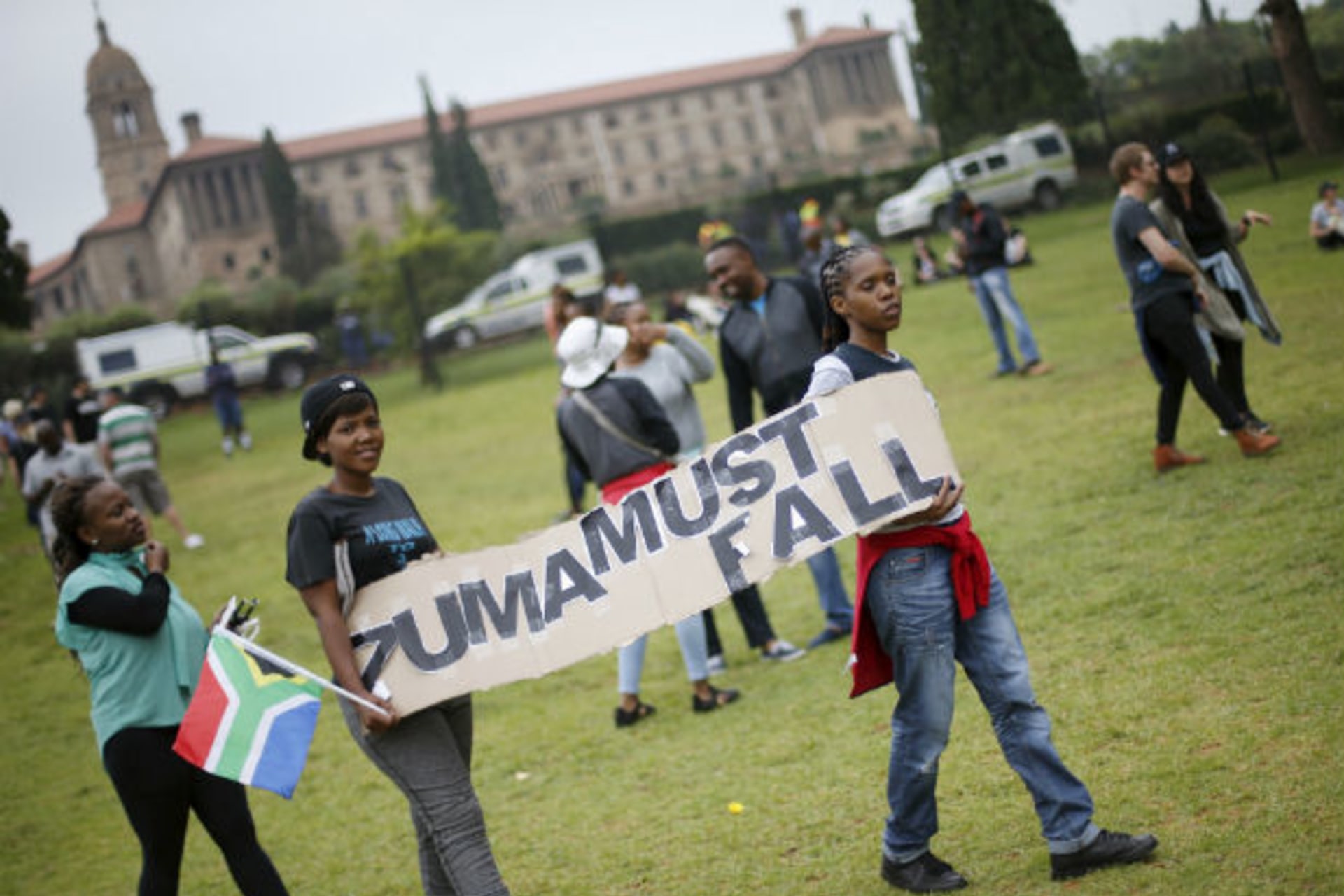 <p>Protesters carry placards as they take part in a “Zuma must fall” demonstration in Pretoria, South Africa, on December 16, 2015.</p>
