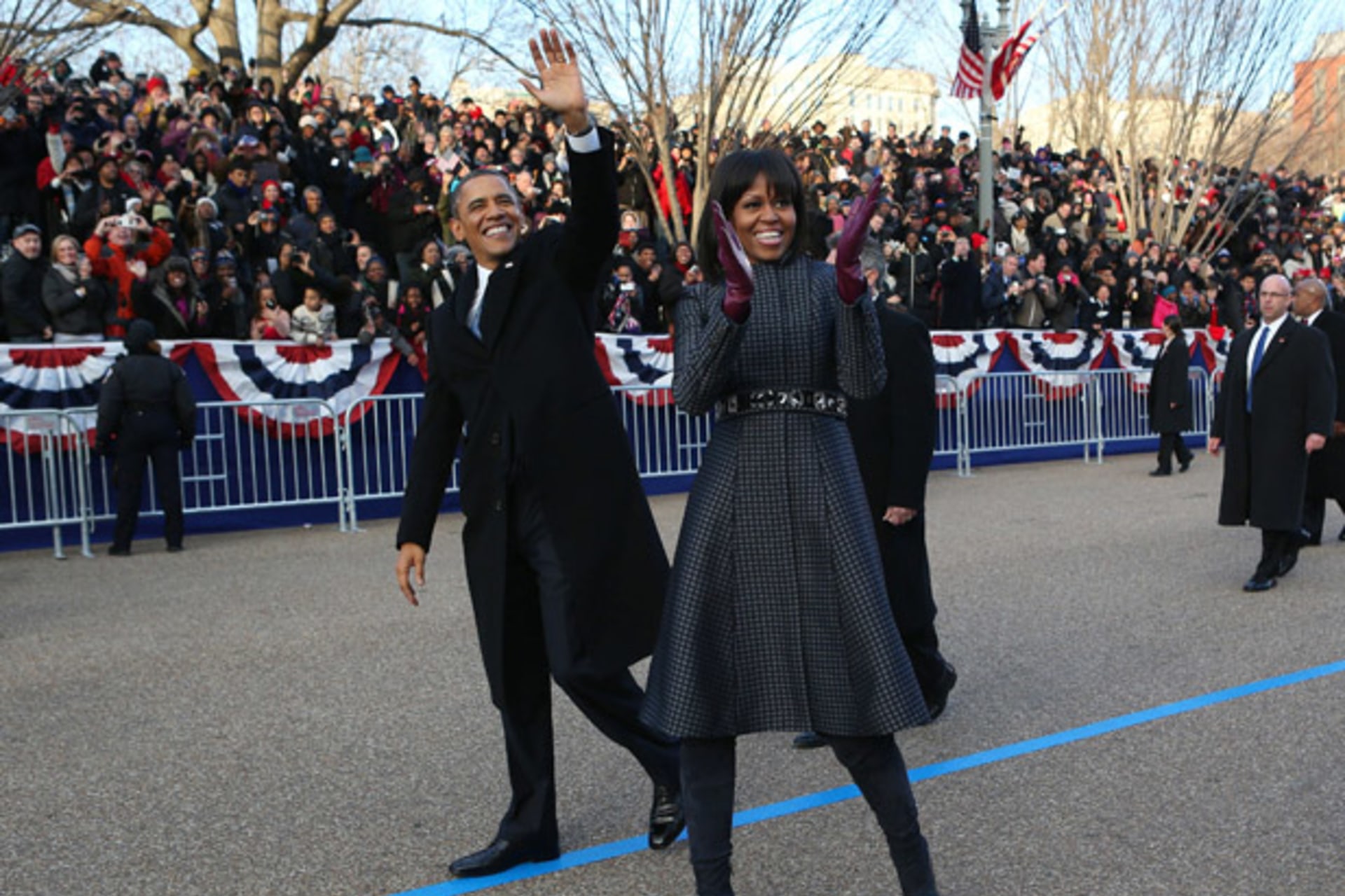<p>President Barack Obama and First Lady Michelle Obama wave to supporters during the inaugural parade in Washington on January 21, 2013 (Doug Mills/Courtesy Reuters).</p>