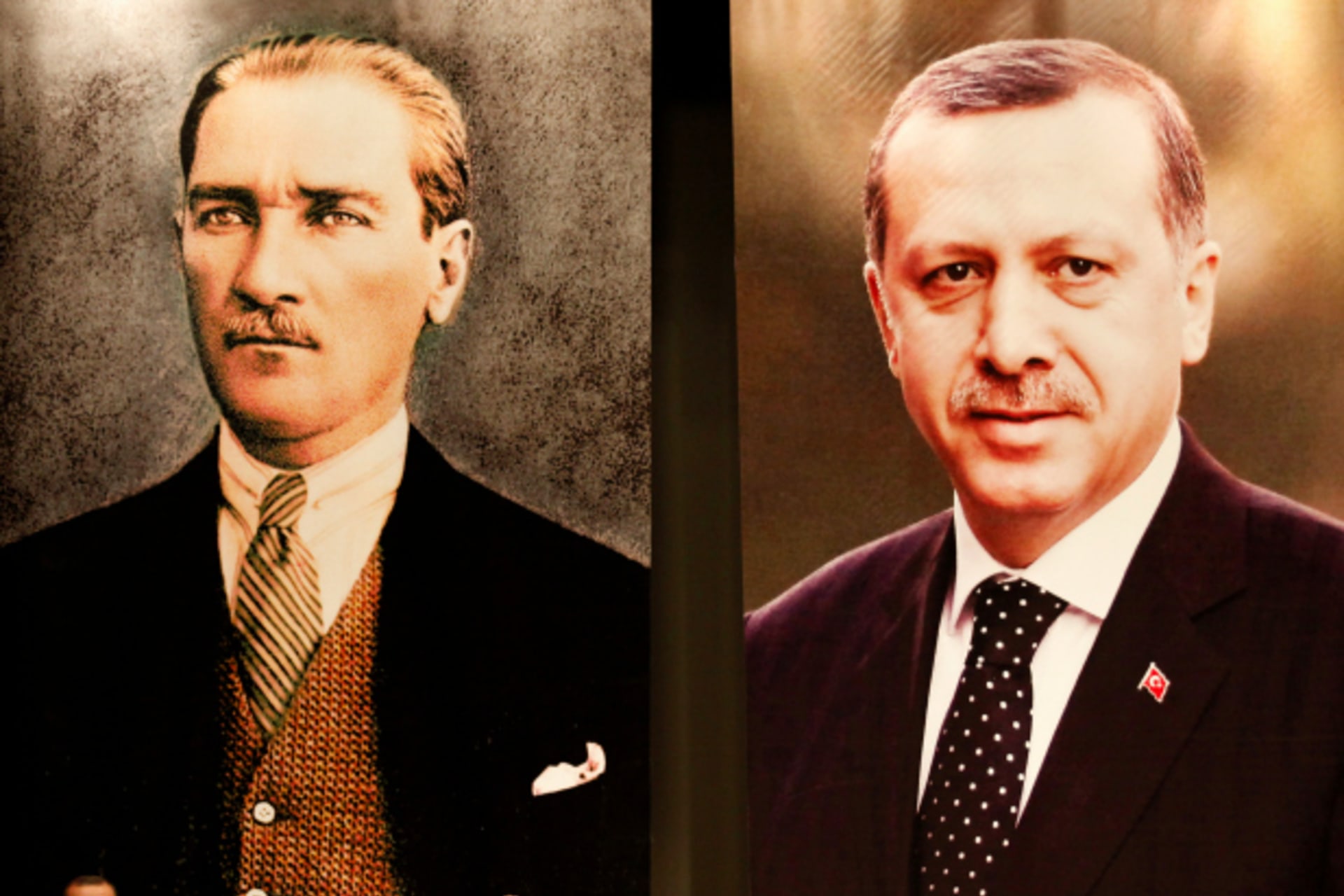 <p>Turkey’s Prime Minister Recep Tayyip Erdogan addresses the members of his ruling AK Party, as he stands in front of the portraits of Mustafa Kemal Ataturk, founder of modern Turkey, and himself (Umit Bektas/Reuters).</p>
