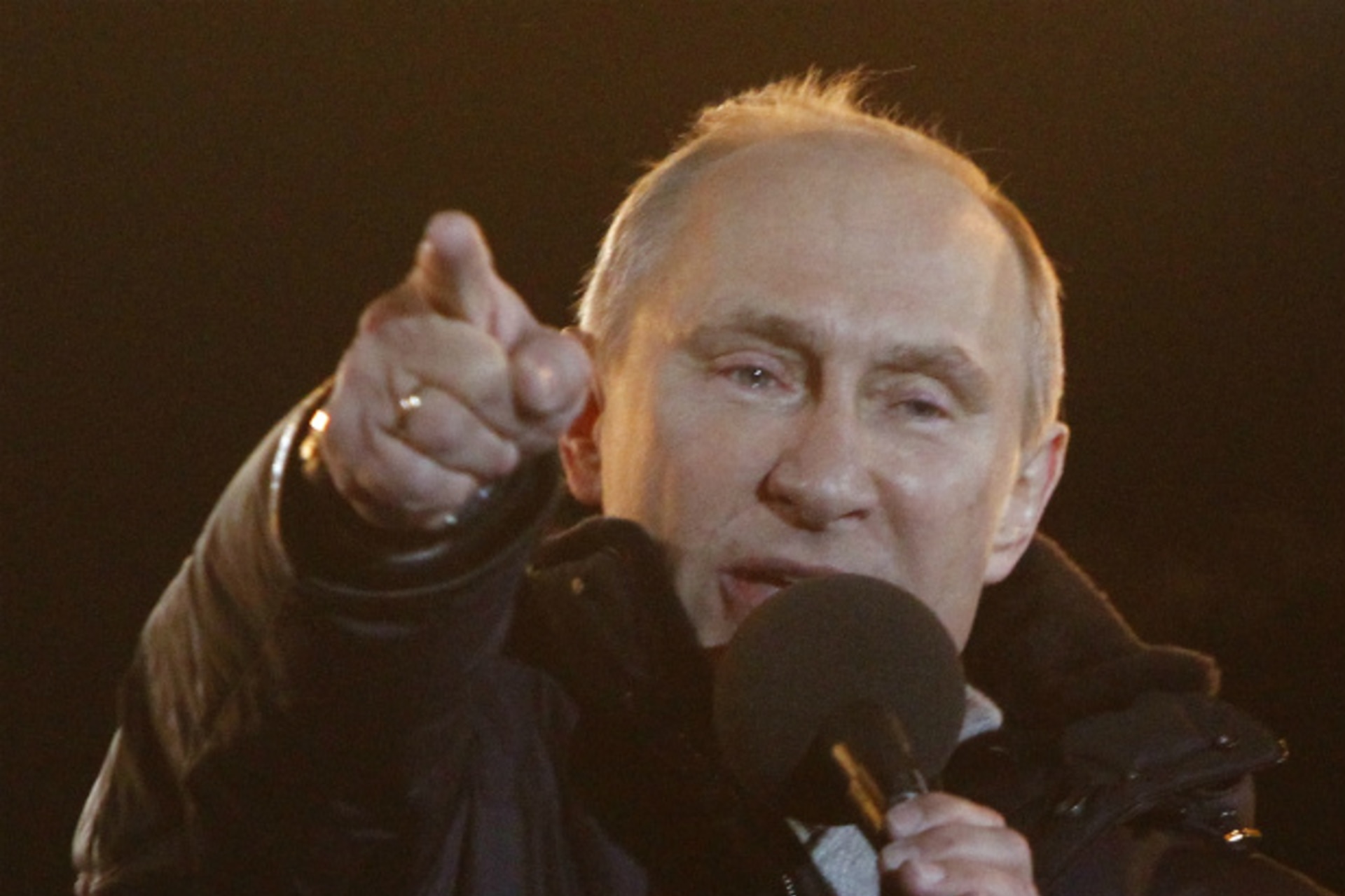 <p>Russia’s current Prime Minister and president-elect Vladimir Putin has tears in his eyes as he addresses supporters. (Mikhail Voskresenskiy/courtesy Reuters)</p>
