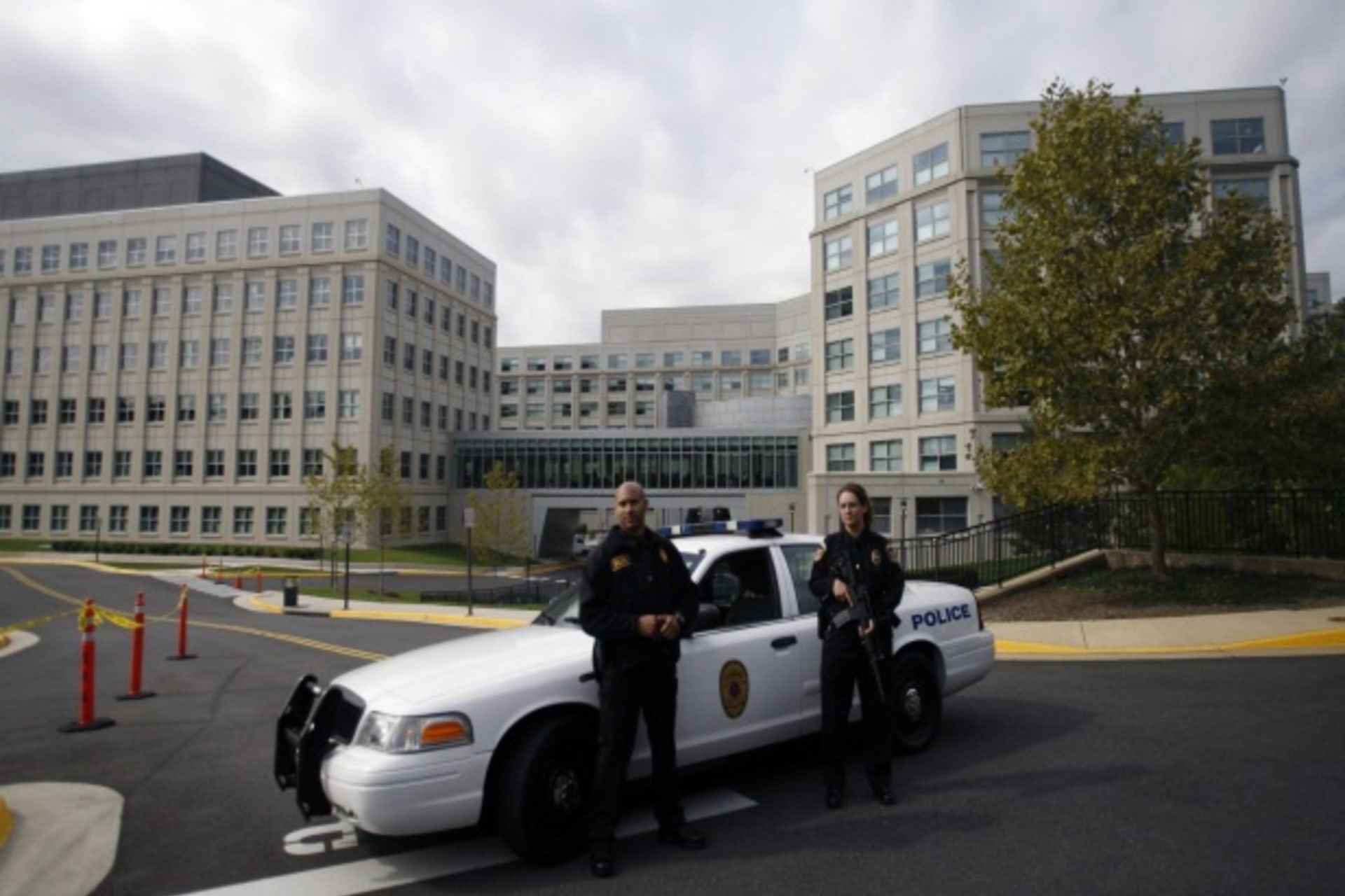 <p>Armed police guard the National Counterterrorism Center in McLean, Virginia, in October 2009 (Jason Reed/Courtesy Reuters).</p>
