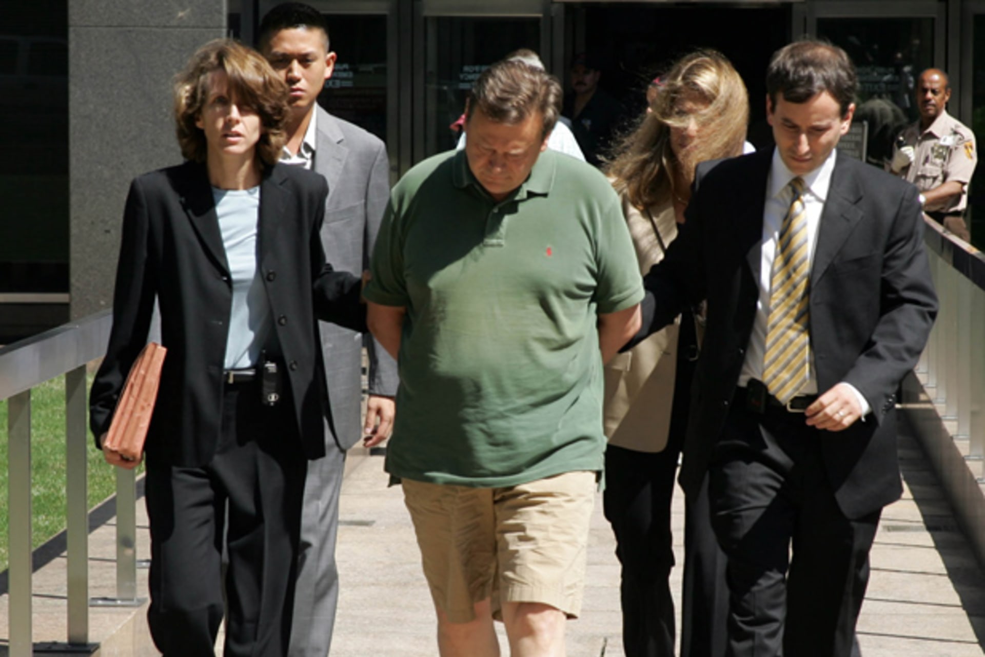 Vladmir Kuznetsov is escorted to federal court in New York.