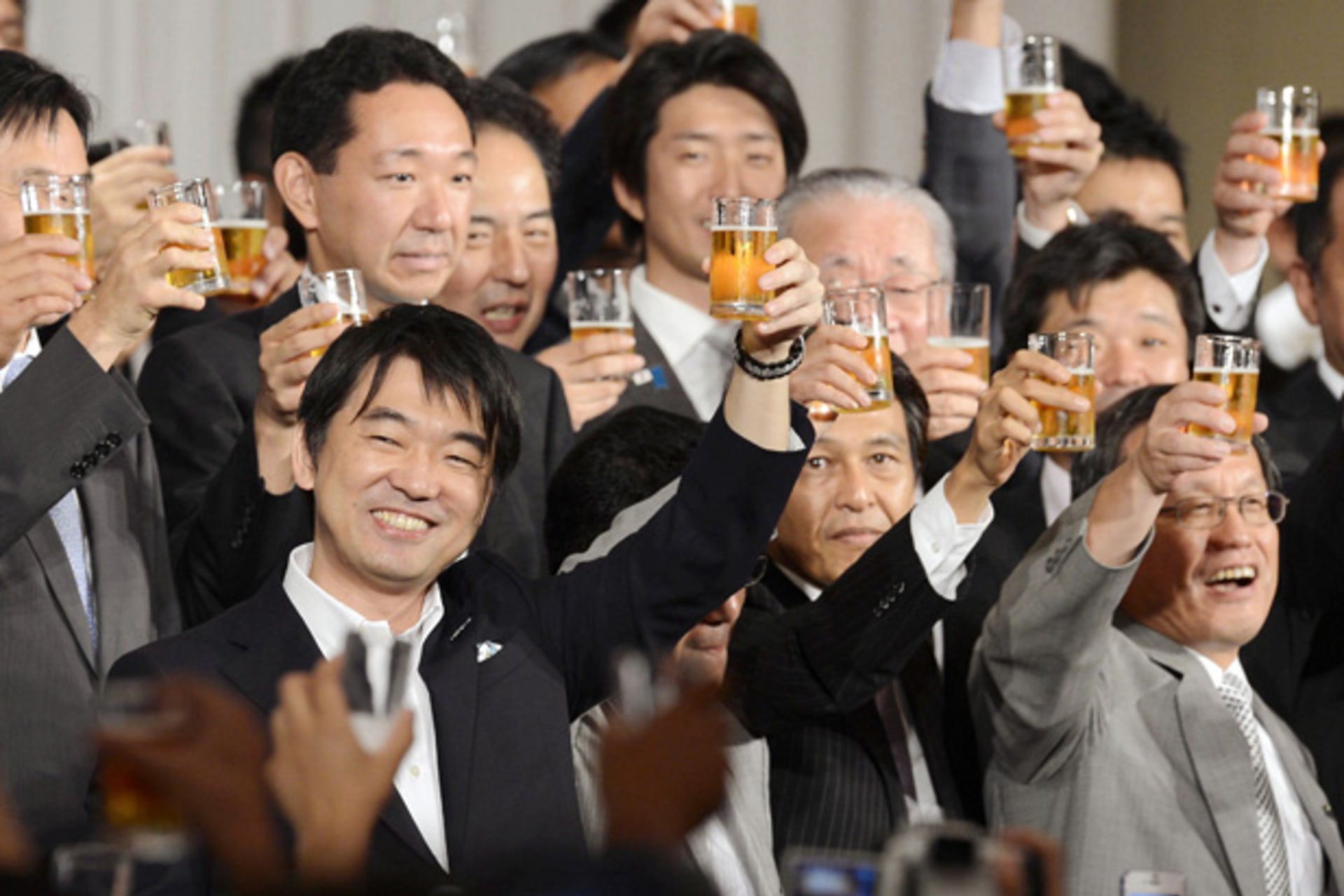 <p>Osaka Mayor Toru Hashimoto toasts with members of his new Japan Restoration Party at a fund-raising party in this photo taken by Kyodo in Osaka</p>
