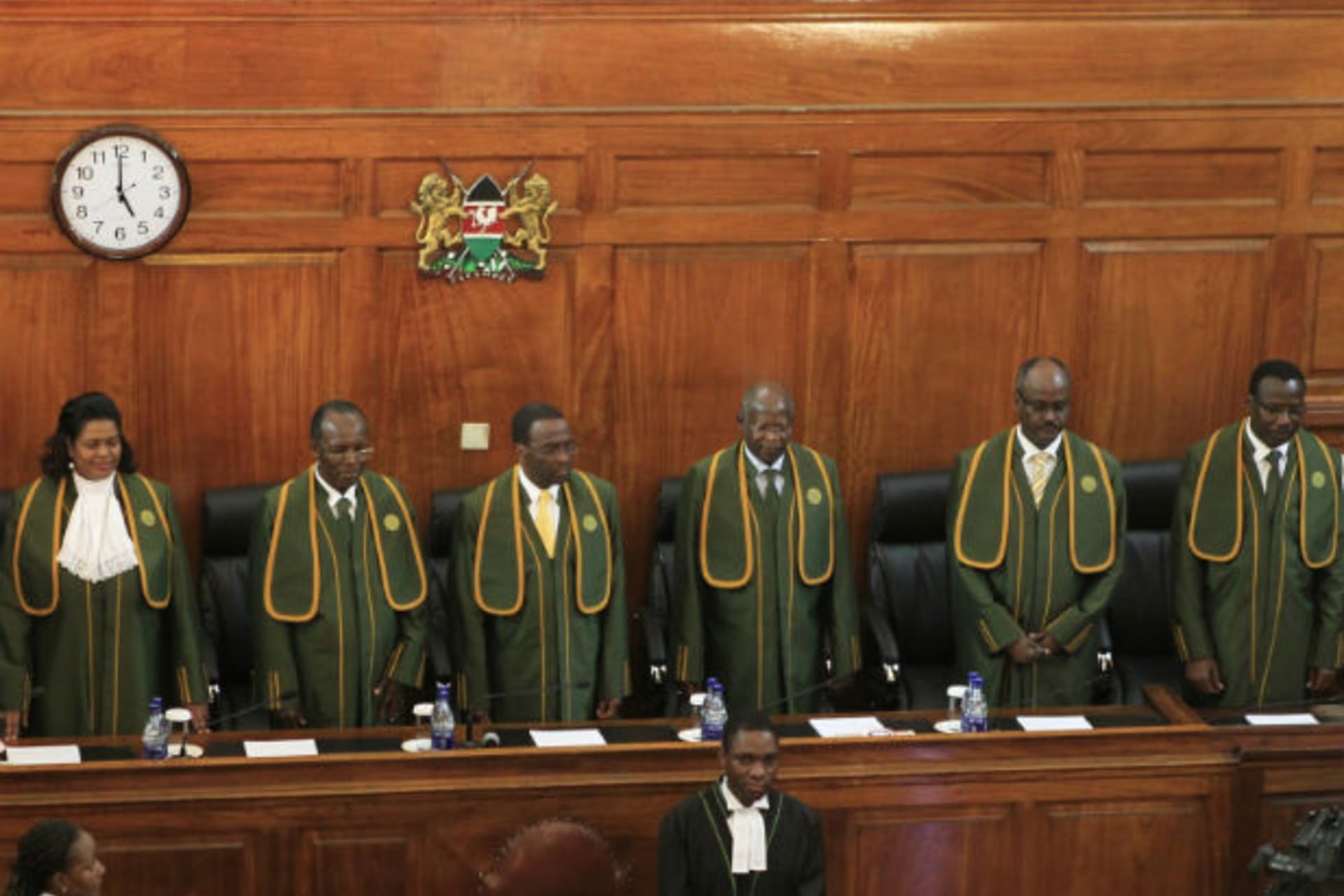 Kenya's Chief Justice Willy Mutunga (3rd L) leads the Supreme Court Judges Njoki Ndungu (L-R), Philip Tunoi, Jackton Ojwang, Mohamed Ibrahim and Smokin Wanjala, in Kenya's capital Nairobi, March 30, 2013.