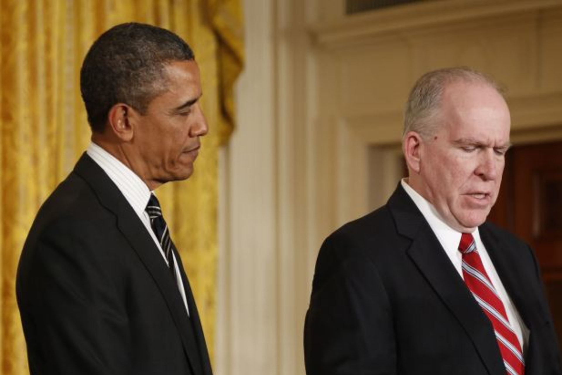 <p>President Obama listens after his announcement of Brennan as his nominee to be the new director of the CIA (Jason Reed/Courtesy Reuters).</p>