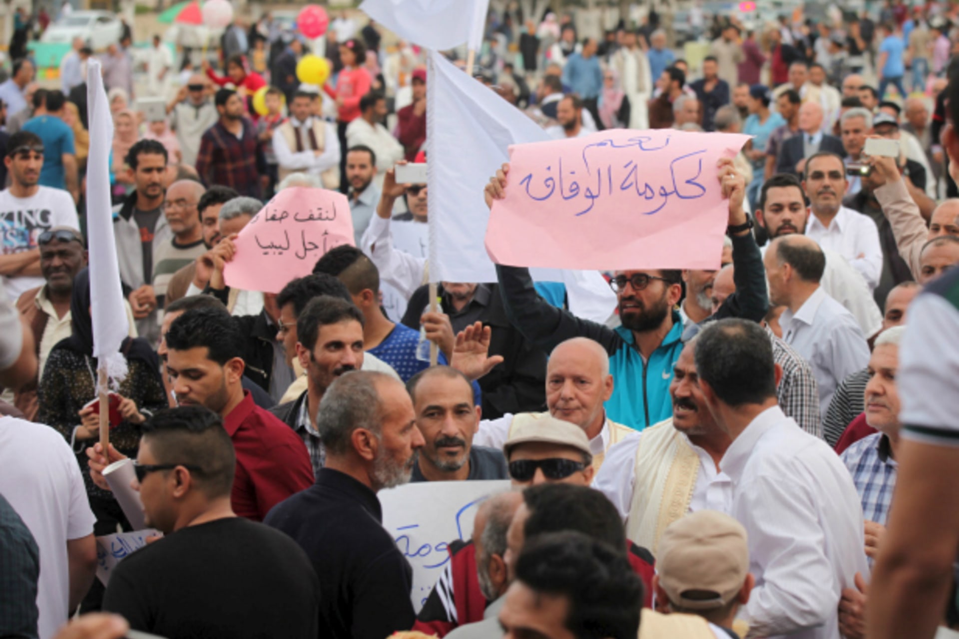 <p>Supporters of the unity government shout slogans during a demonstration at Martyrs’ Square in Tripoli (Hani Amara/Reuters).</p>
