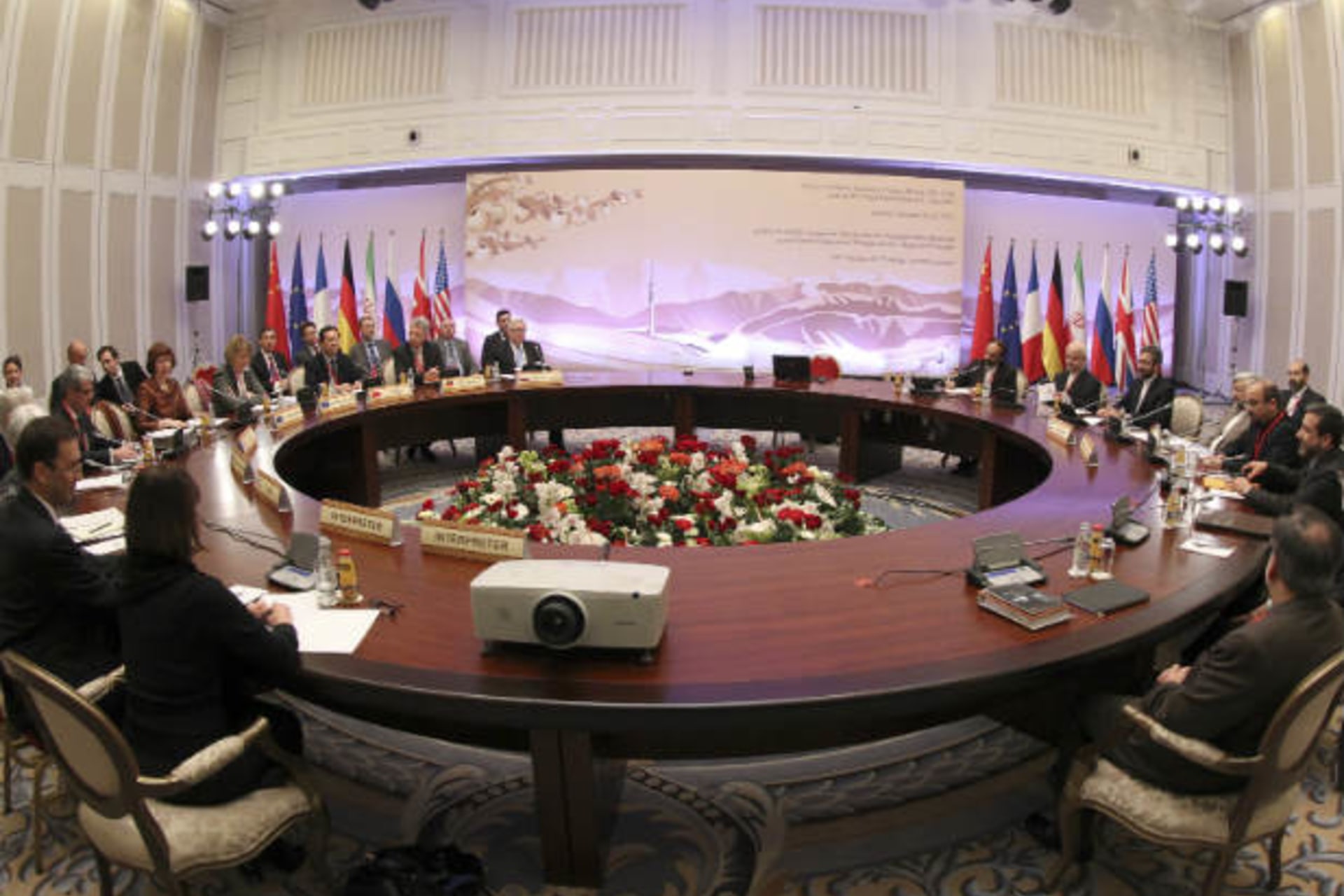 Participants sit at a table during talks on Iran's nuclear program in Almaty on February 26, 2013 (Filippov/Courtesy Reuters)..
