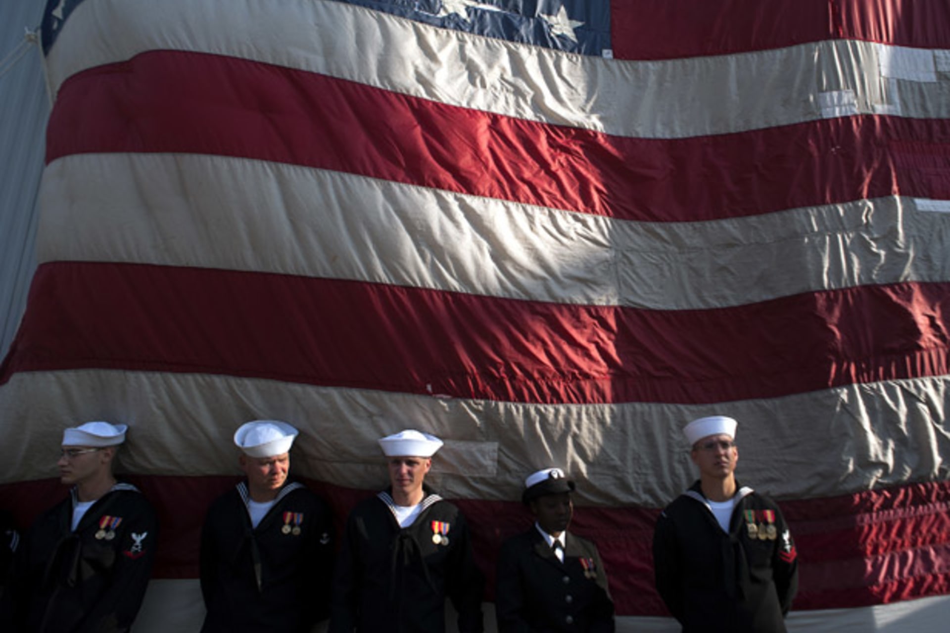 <p>Sailors stand during a commissioning ceremony for the USS Michael Murphy in New York on October 6, 2012. (Keith Bedford/ courtesy Reuters)</p>
