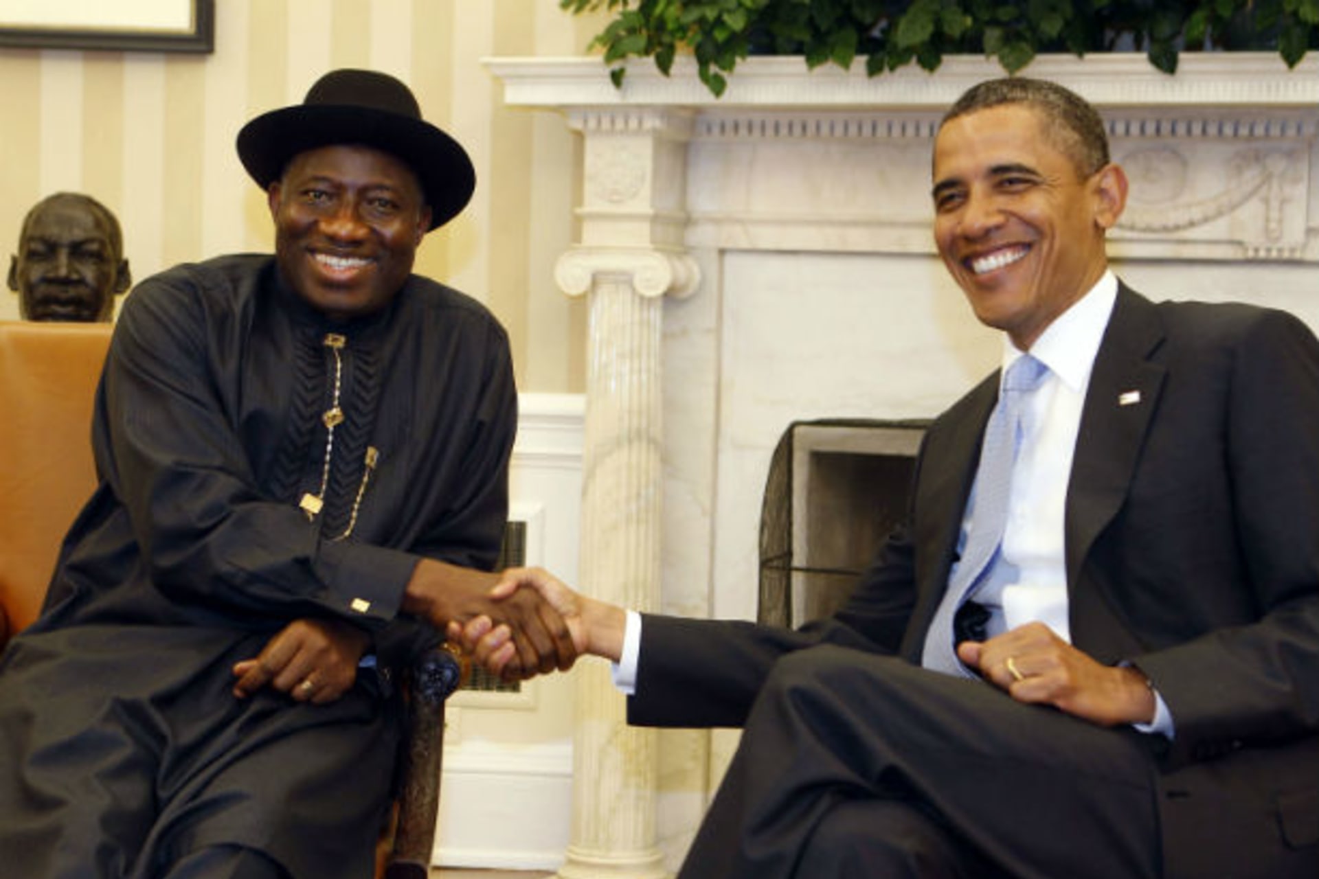 U.S. President Barack Obama shakes hands with Nigerian President Goodluck Jonathan in the Oval Office of the White House in Washington June 8, 2011.