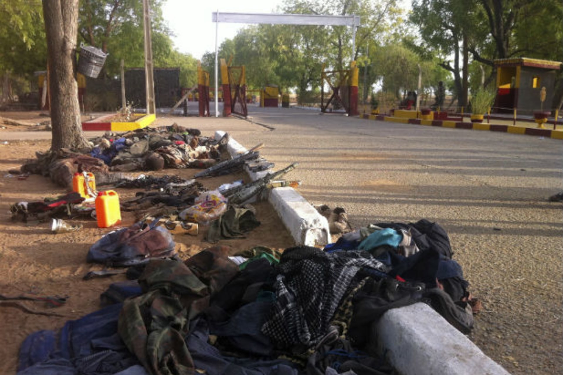 Recovered weapons, personal items and bodies of some members of the Nigerian Islamist sect Boko Haram are seen in Bama, Maiduguri, Borno State, Nigeria. May 7, 2013.