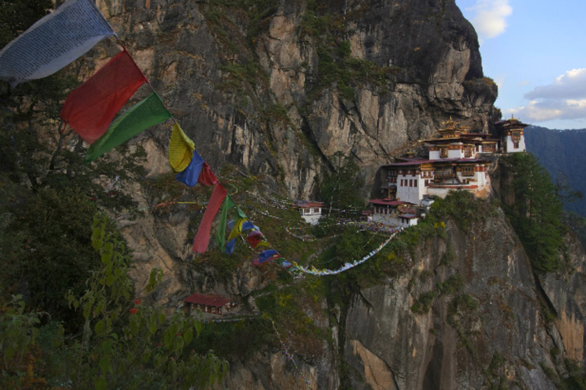 <p>File photo: Prayer flags hang near the ParoTaktsang Palphug Buddhist monastery, also known as the Tiger’s Nest, in Paro district, Bhutan on October 16, 2011 (Adrees Latif/Courtesy: Reuters).</p>
