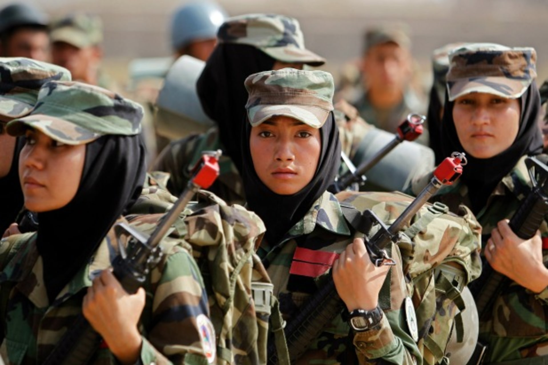 <p>Afghan National Army (ANA) female officers take part in a training exercise at the Kabul Military Training Centre (KMTC) in Kabul, October 8, 2013. (Omar Sobhani/Reuters)</p>
