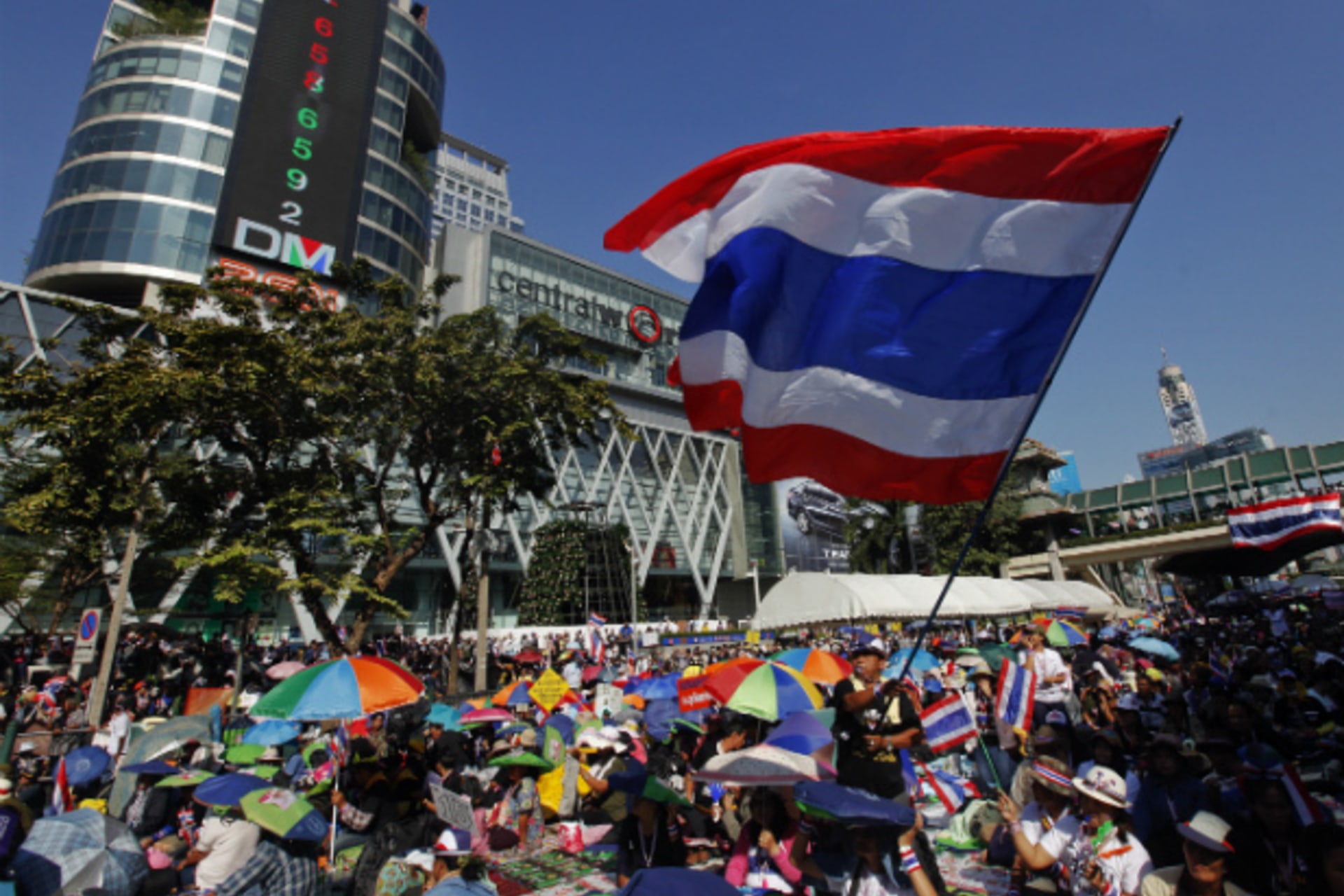 <p>Anti-government protesters block a major intersection in Bangkok’s shopping district on January 13, 2014. Tens of thousands of…to force the resignation of Thai Prime Minister Yingluck Shinawatra and meeting no resistance. (Kerek Wongsa/Courtesy Reuters)</p>
