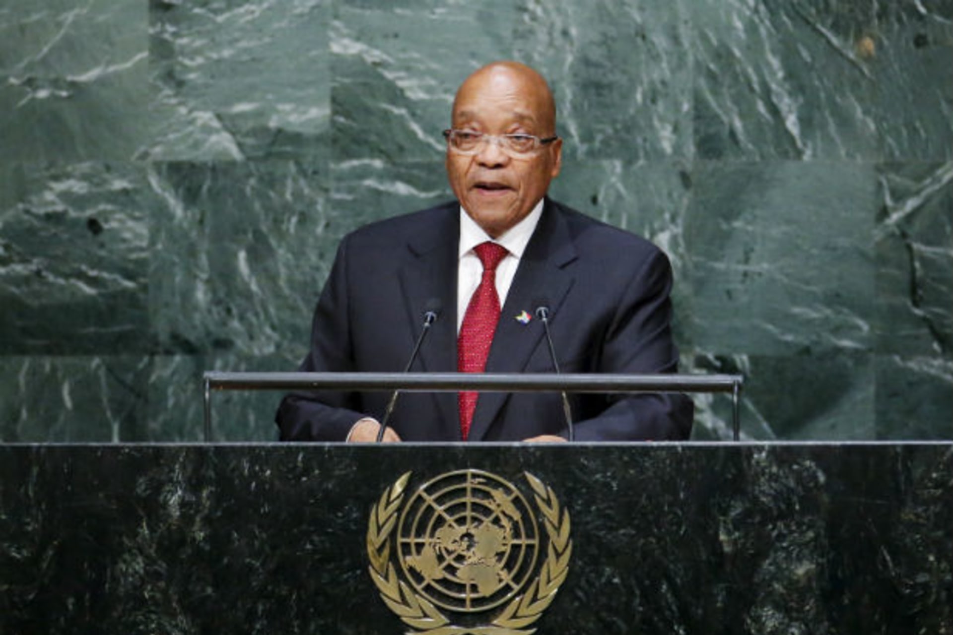 <p>South African President Jacob Zuma addresses attendees during the seventieth session of the United Nations General Assembly at UN headquarters in New York on September 28, 2015.</p>
